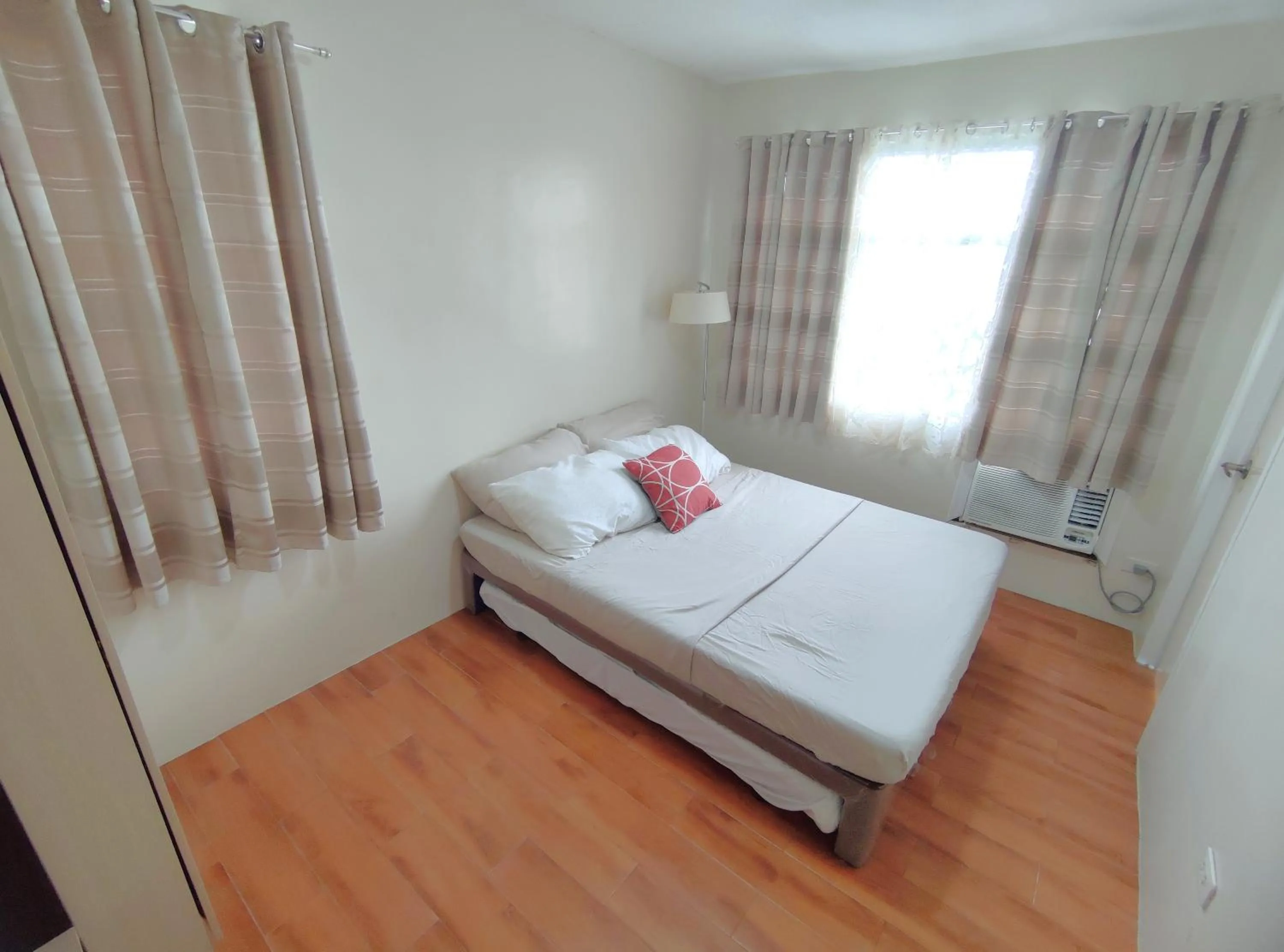 Bed in Davao Condo 2BR Pool Wifi Netflix