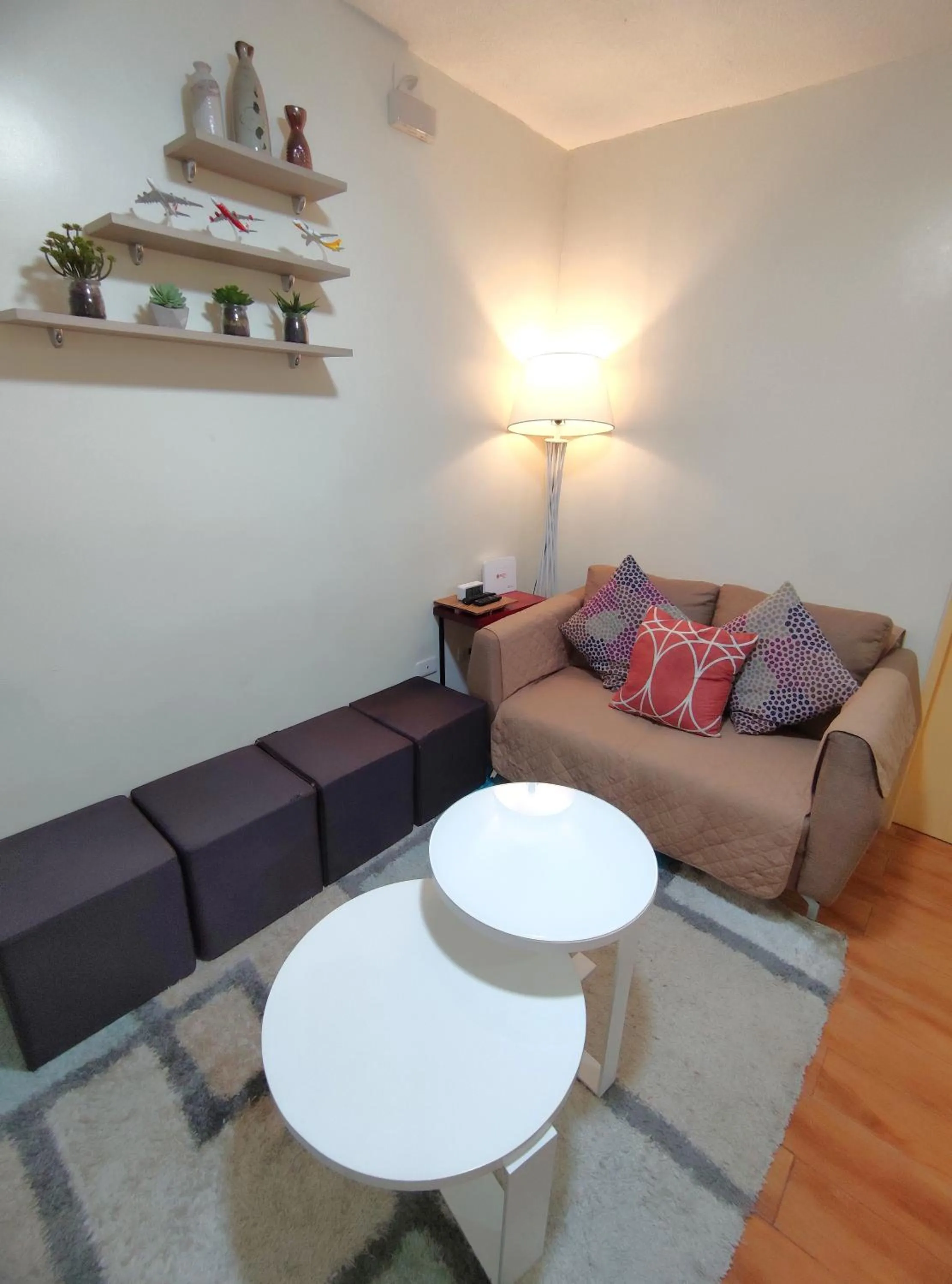 Living room in Davao Condo 2BR Pool Wifi Netflix