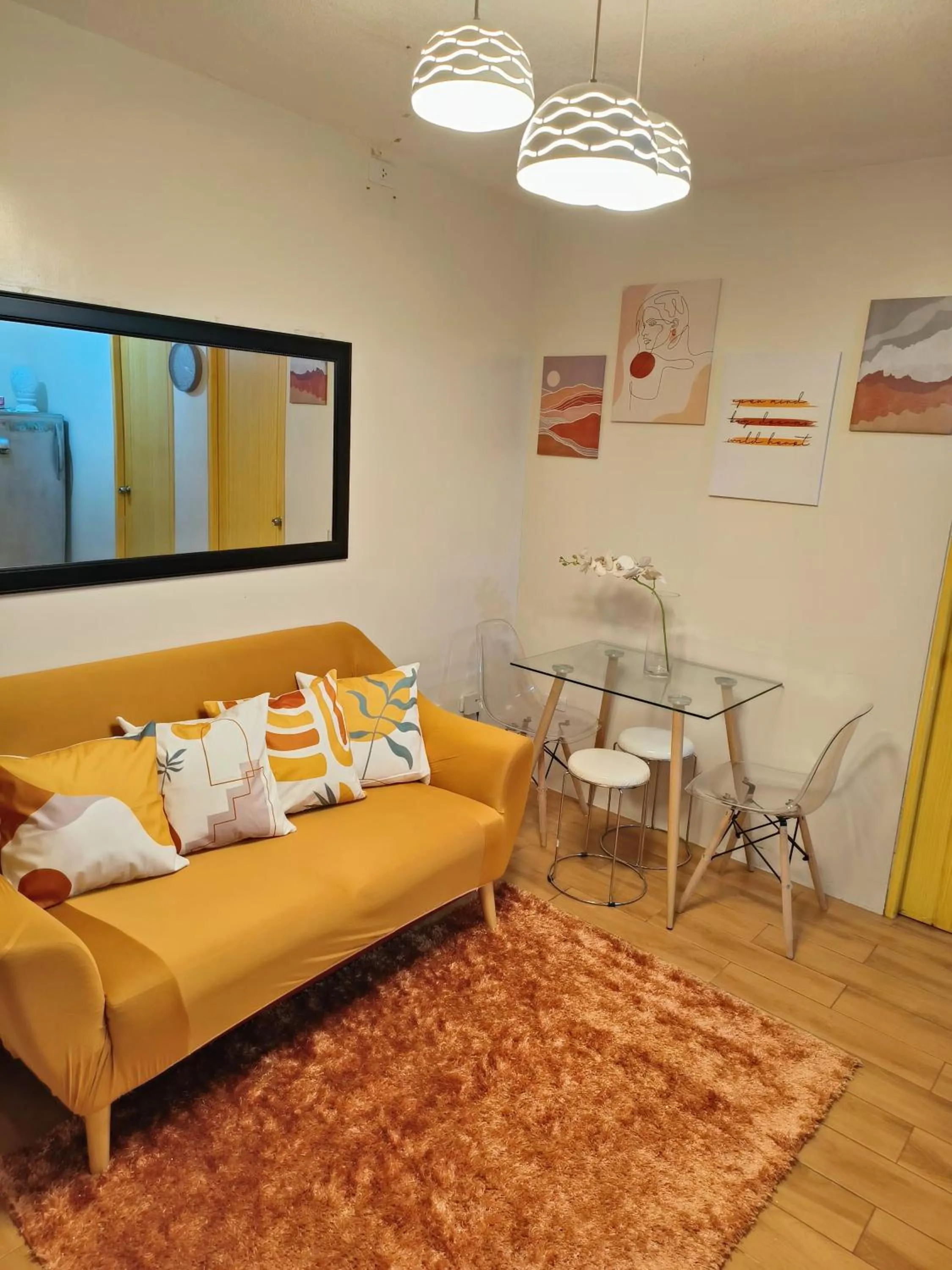 Living room in Davao Condo 2BR Pool Wifi Netflix