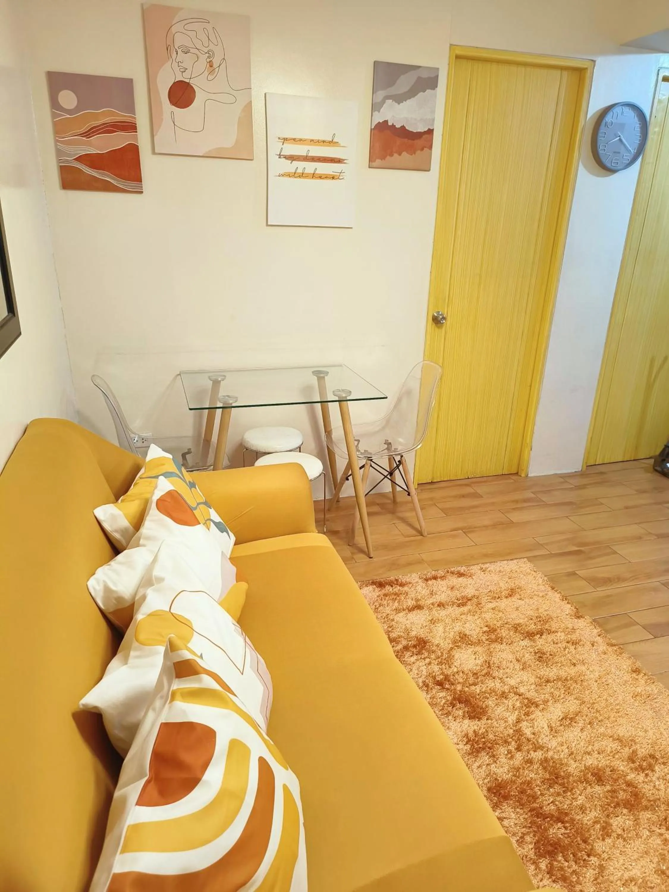 Living room in Davao Condo 2BR Pool Wifi Netflix