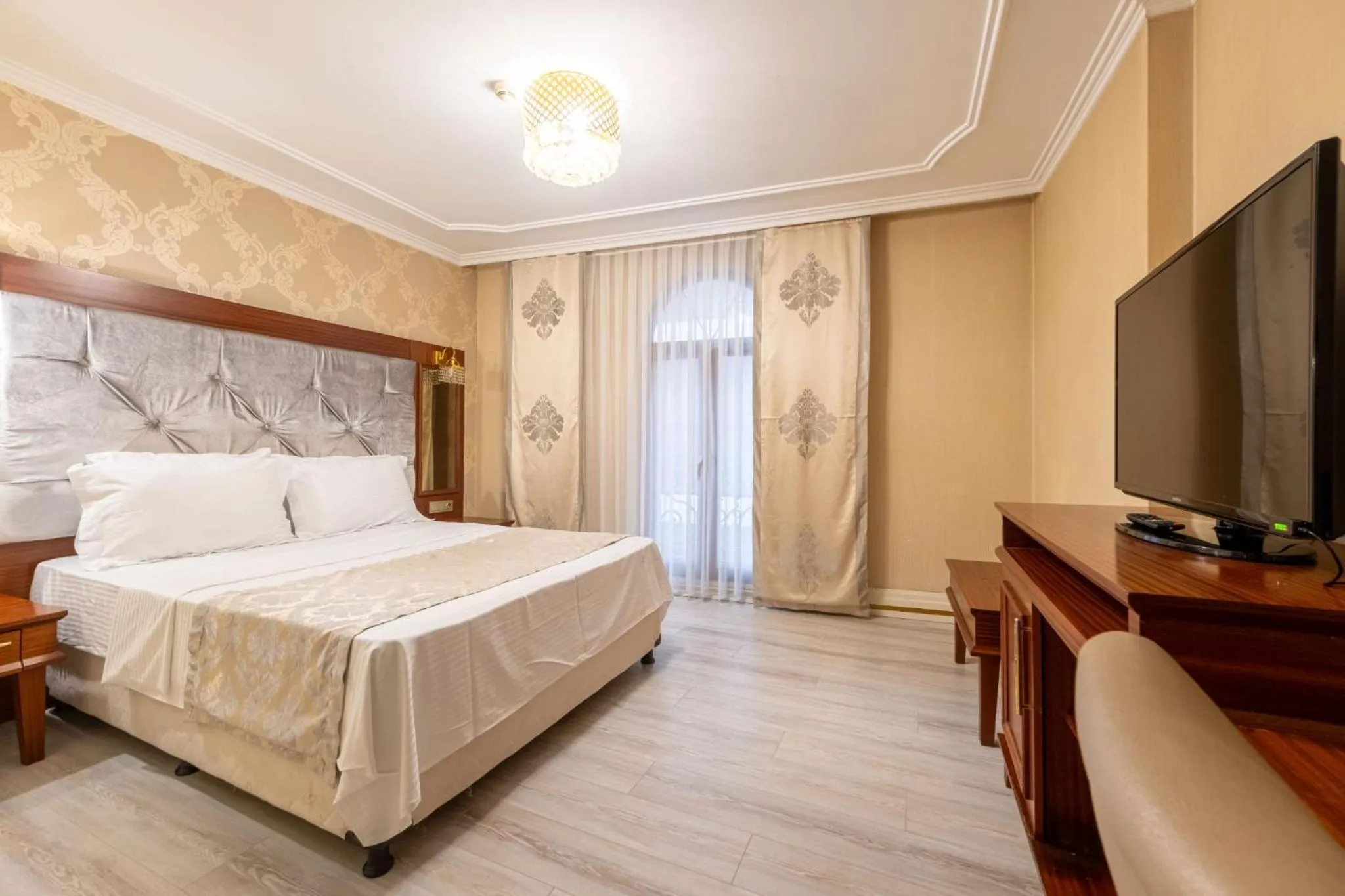 Bed in Myy Boutique Hotel