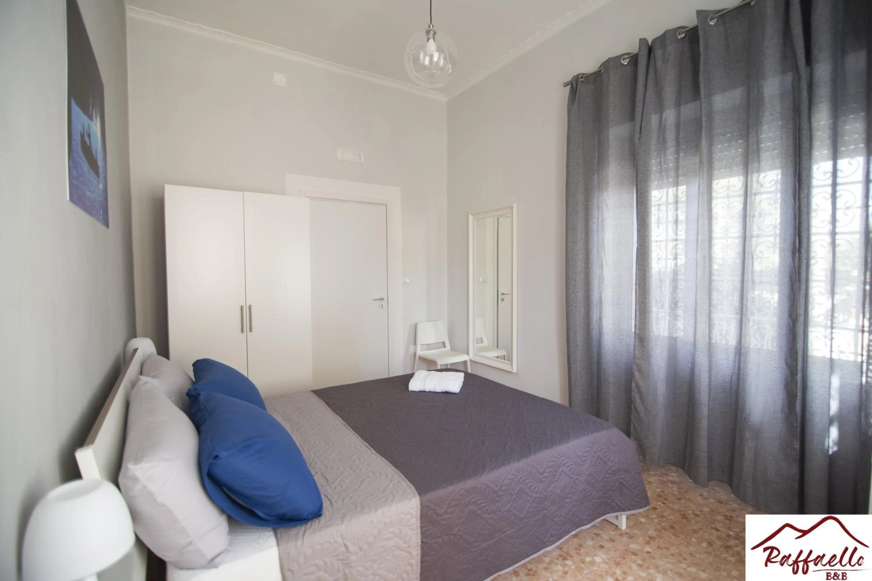 Bed in B & B Raffaello