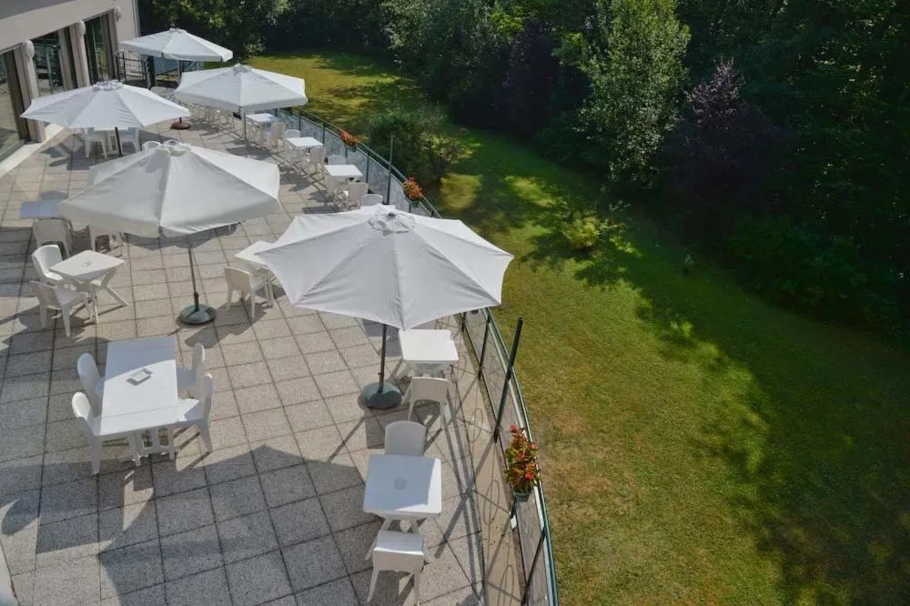 Balcony/Terrace in Logis Hôtel - Restaurant Le Tulipier