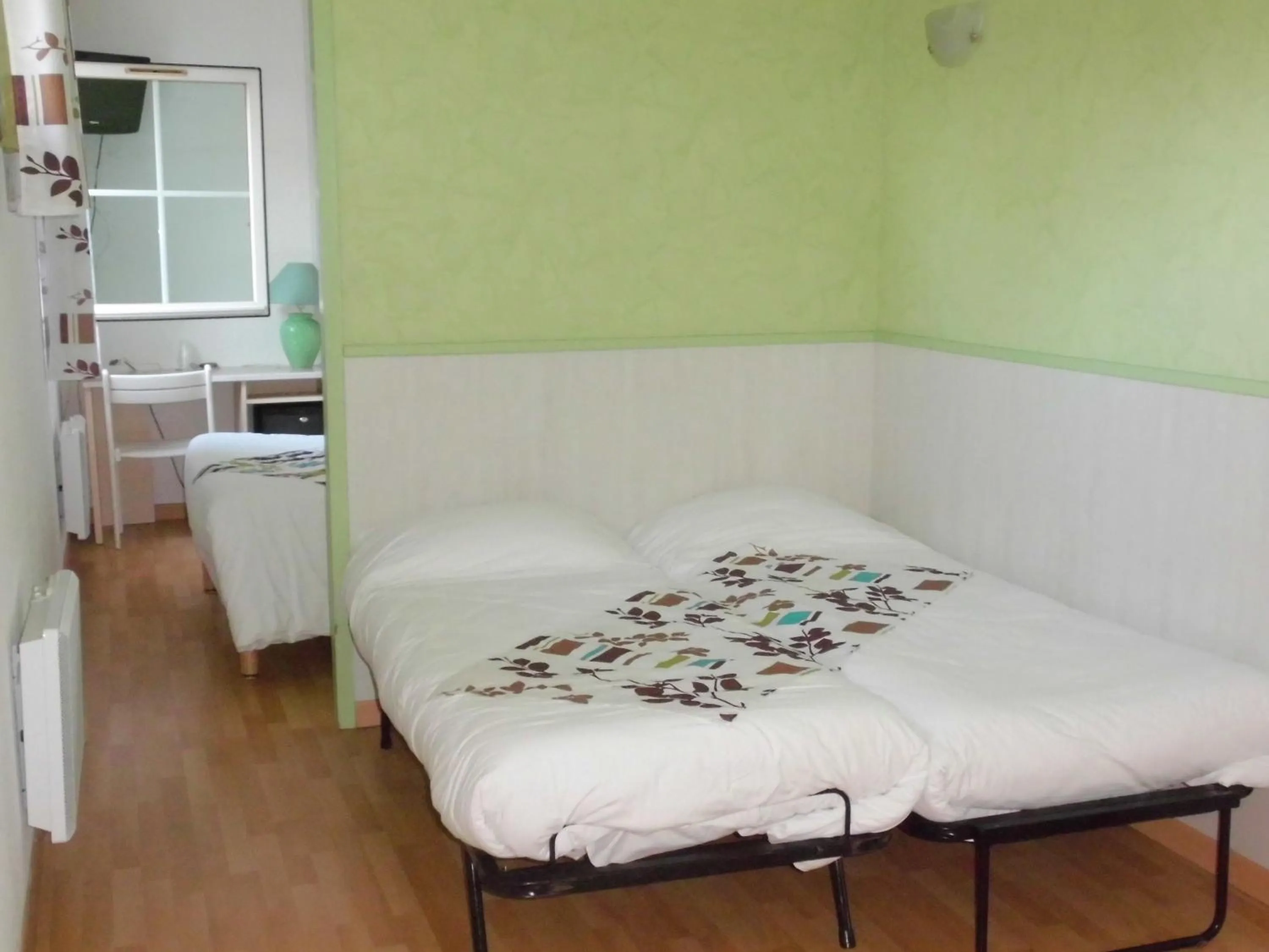 Photo of the whole room, Bed in Hôtel La Bérangère