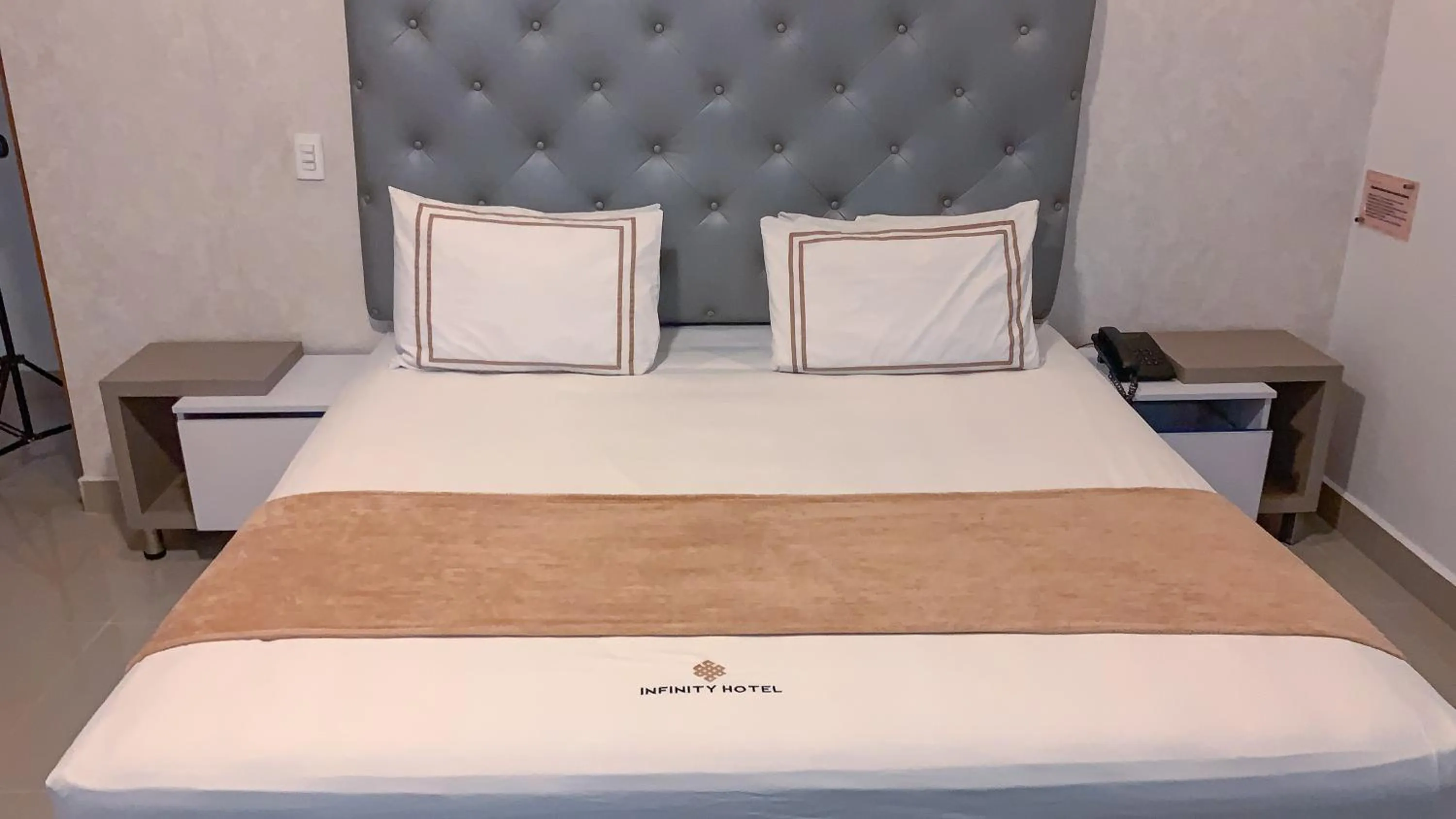 Bed in Infinity Hotel