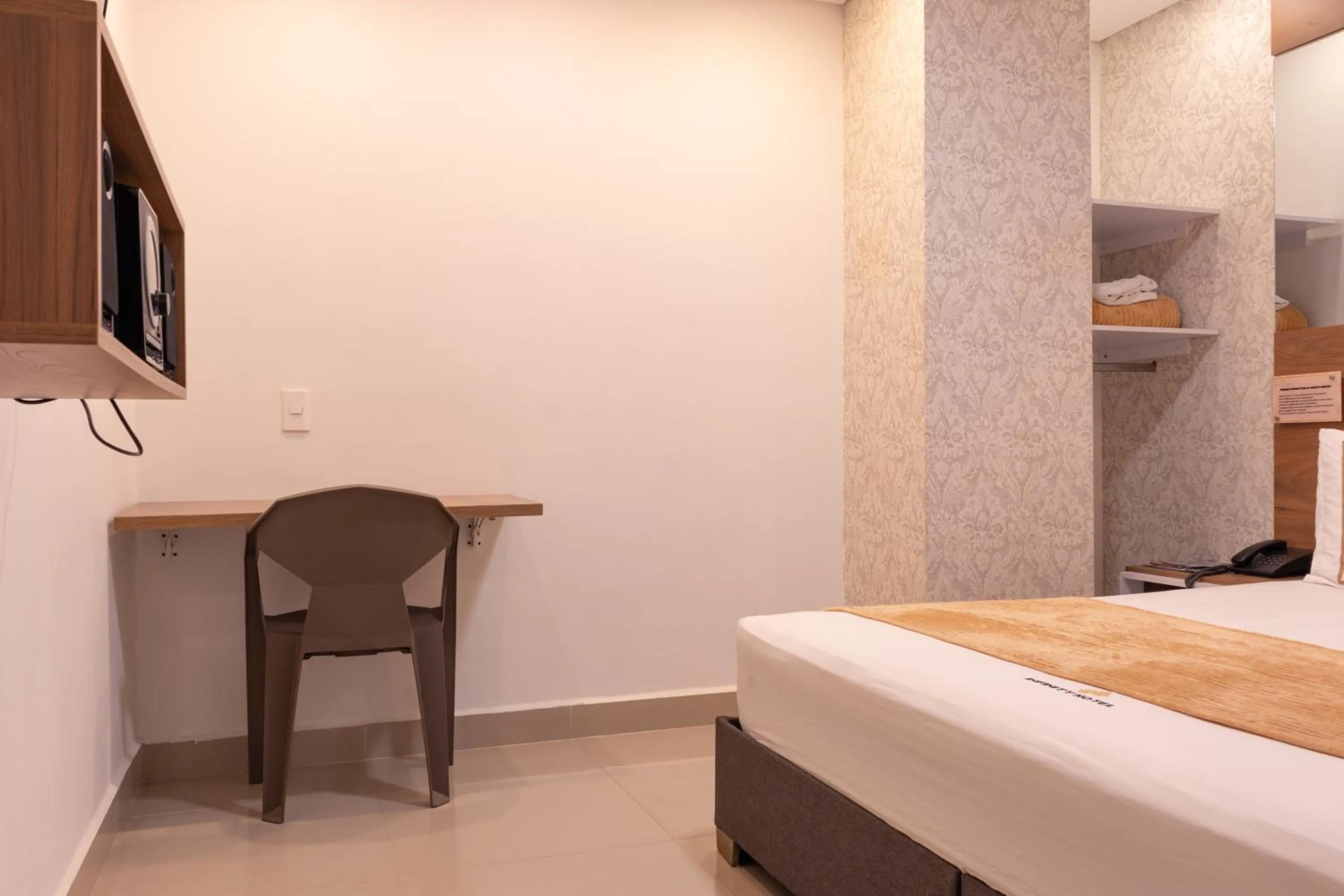 Bed in Infinity Hotel