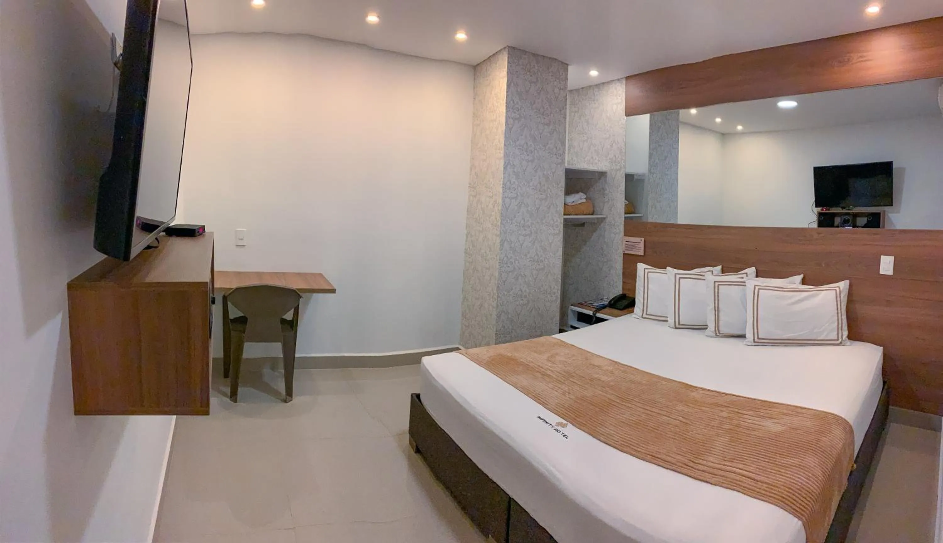 Bed in Infinity Hotel