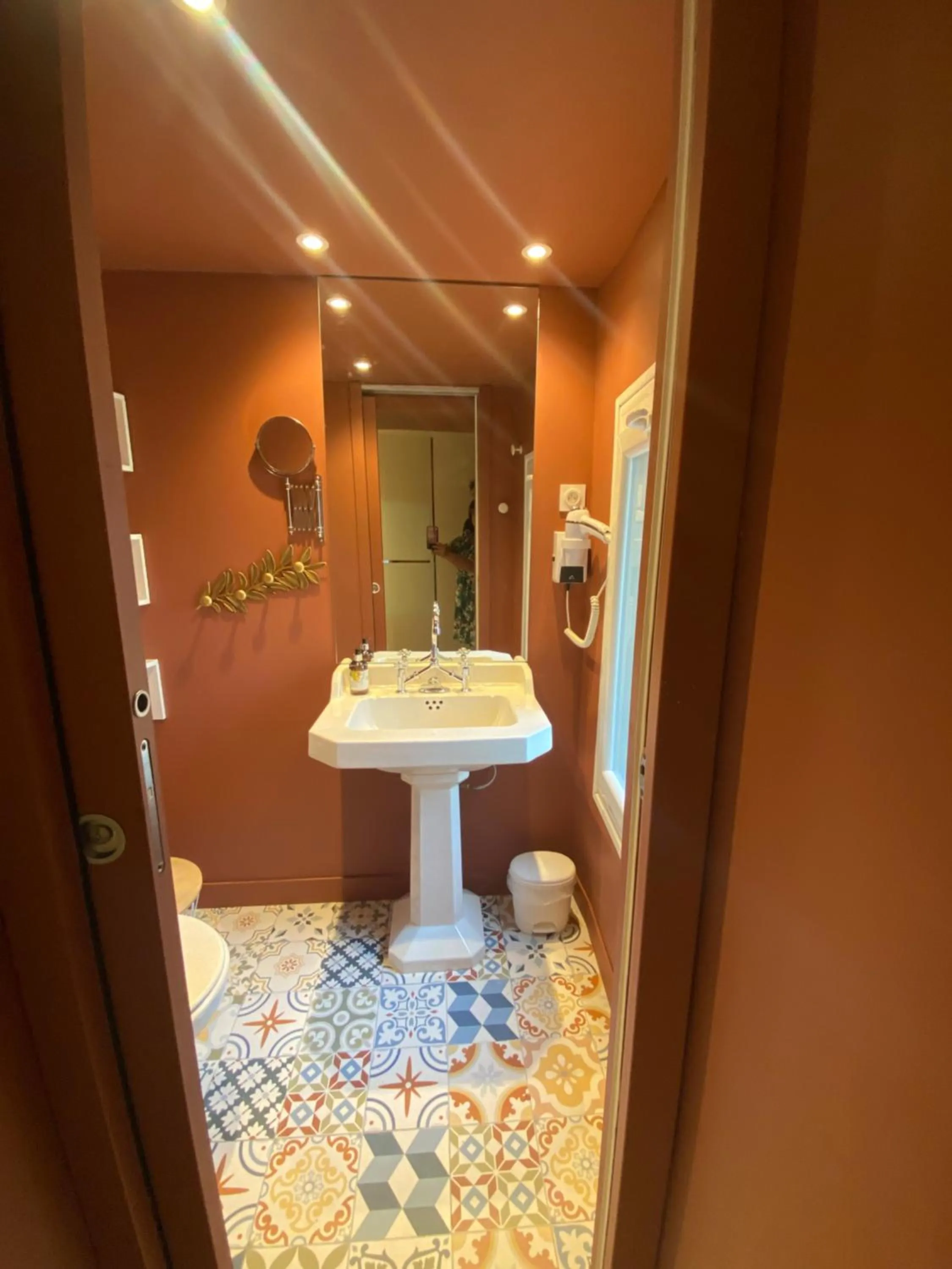 Bathroom in Logis Hôtel Le Glacier