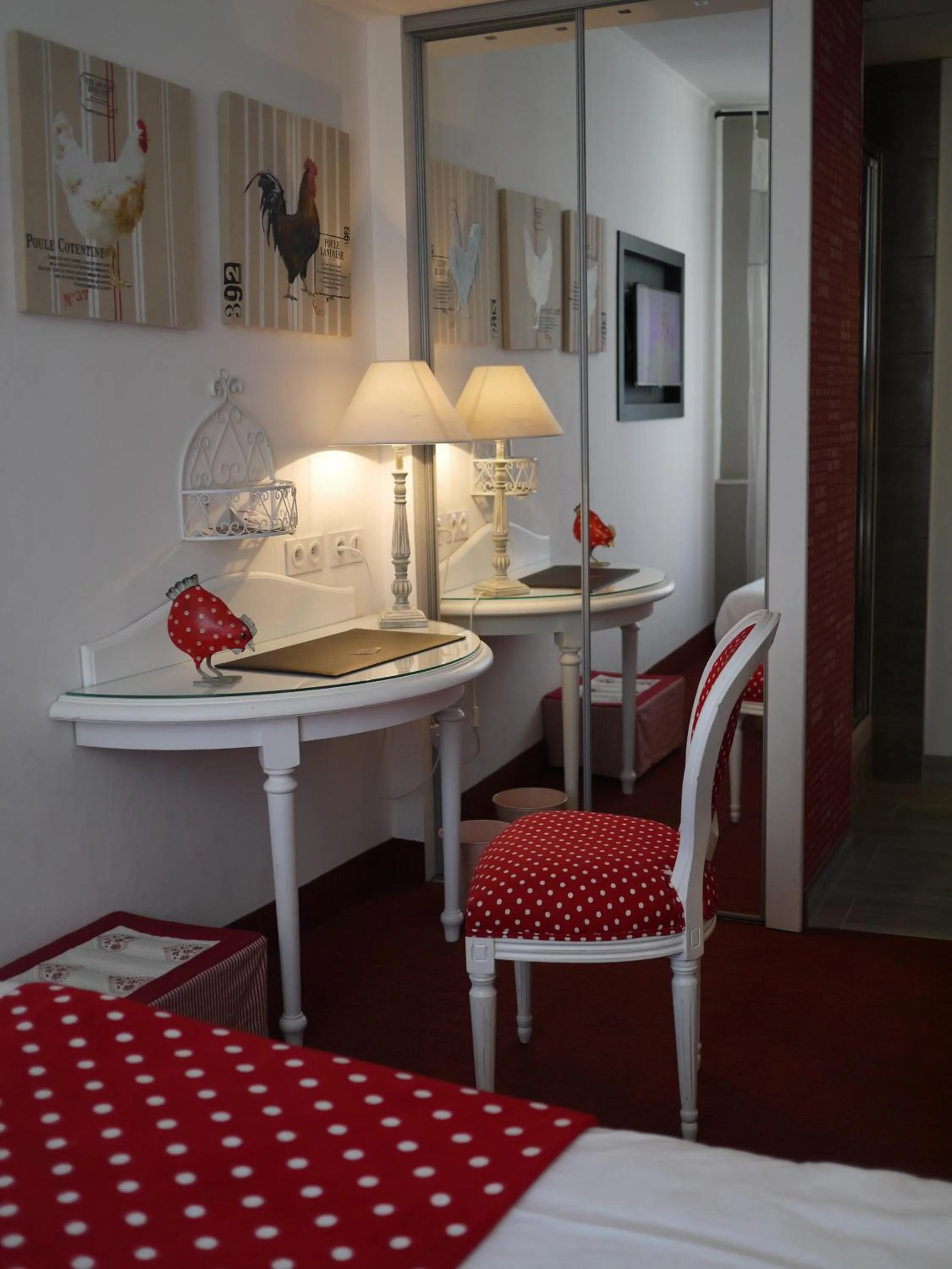 Seating area in Logis Hôtel Le Glacier