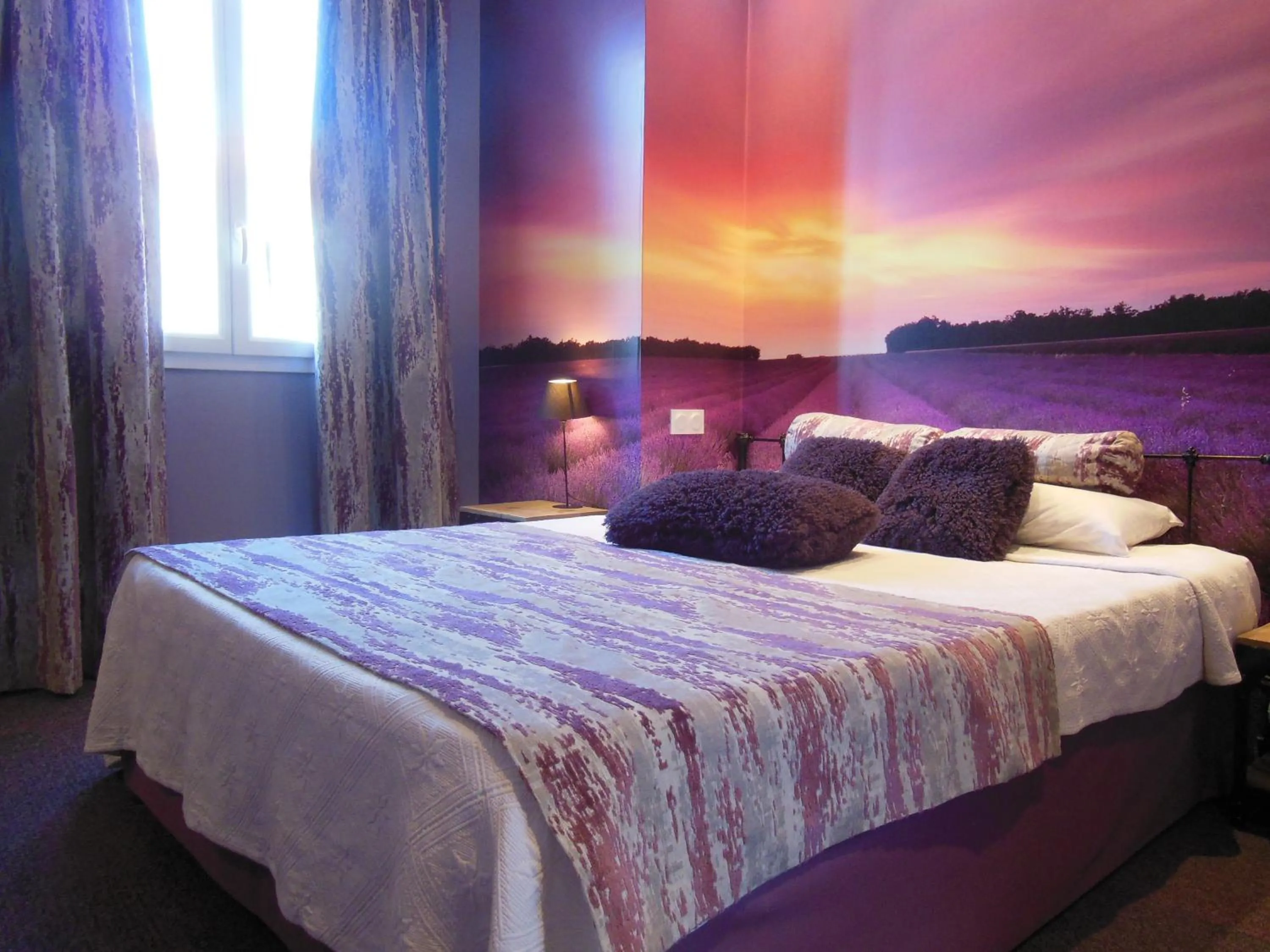 Bed in Logis Hôtel Le Glacier