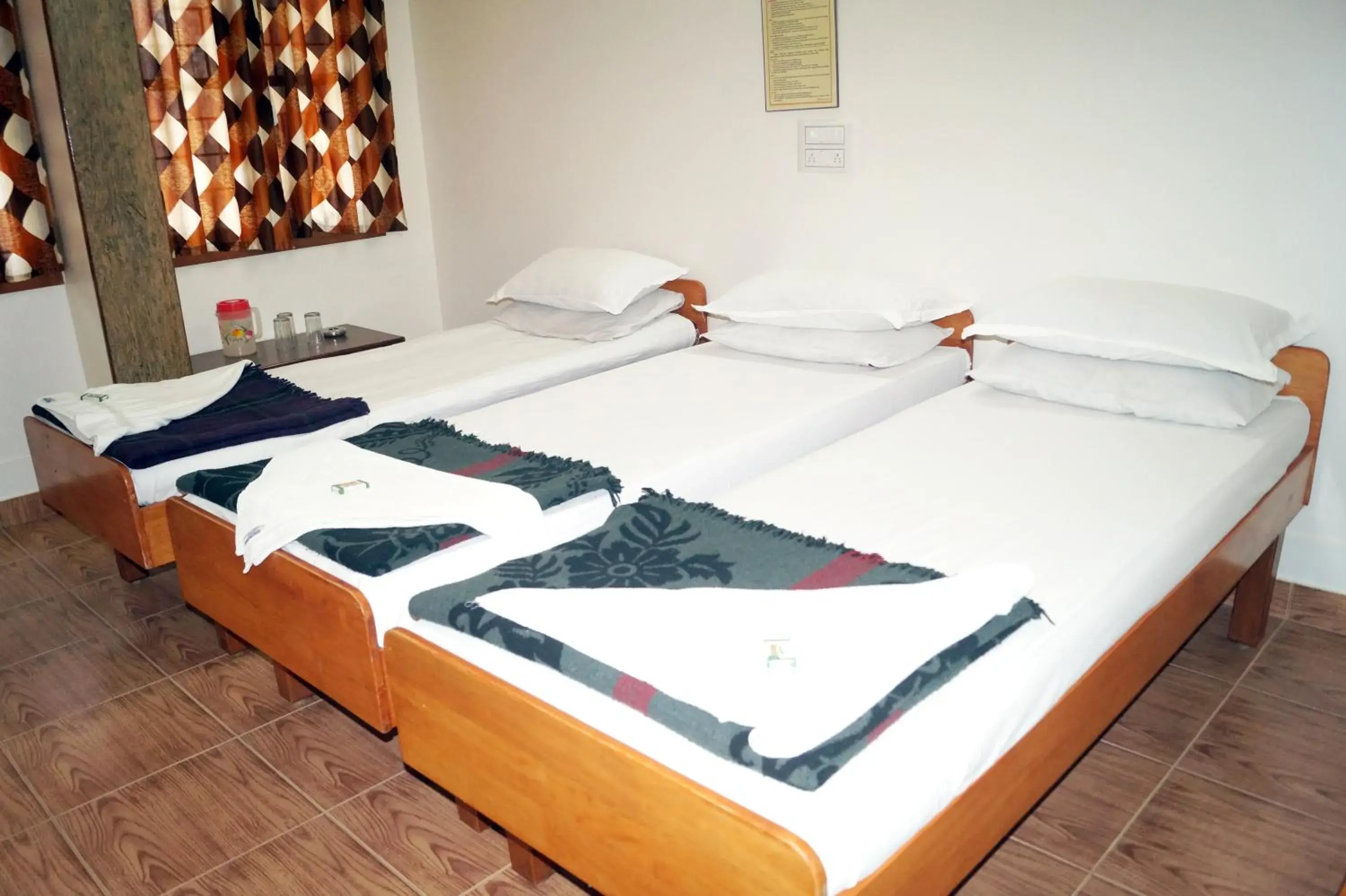 Photo of the whole room, Bed in Sri Kumara Lodge Photo of the whole room, Bed in Sri Kumara Lodge