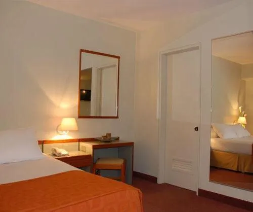 Bed in Hotel Cristina Suites