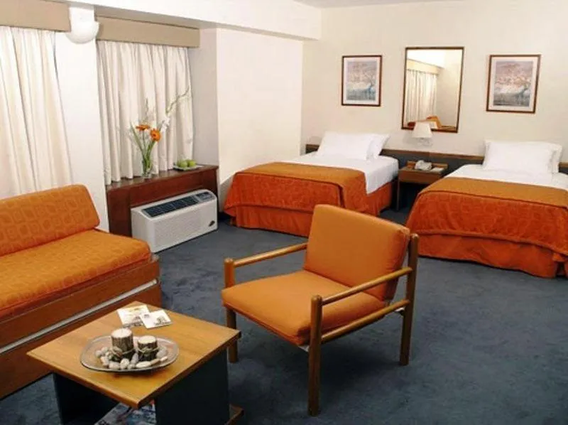 Bed in Hotel Cristina Suites