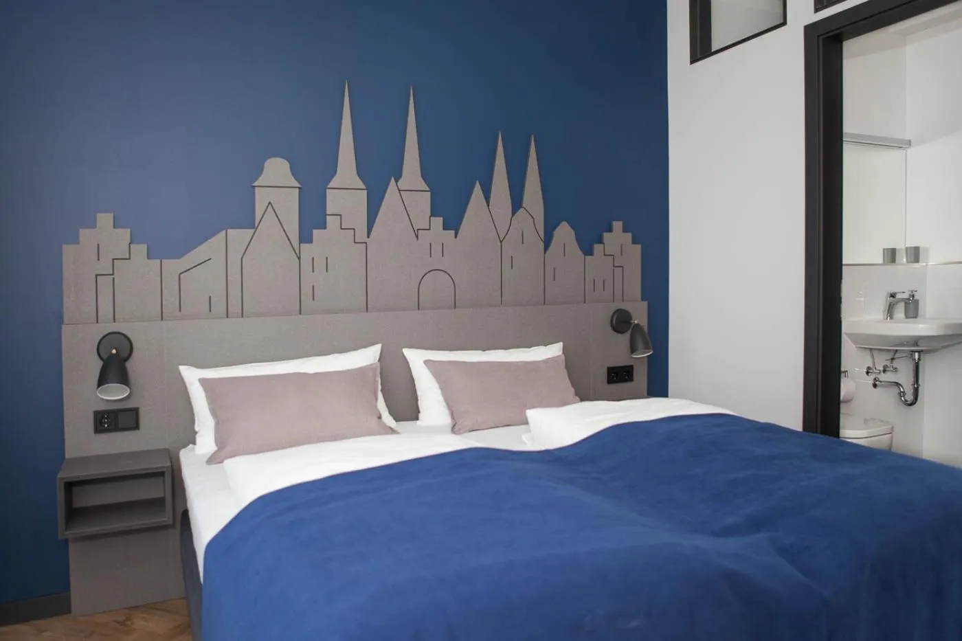 Bed in Stadtrandzimmer