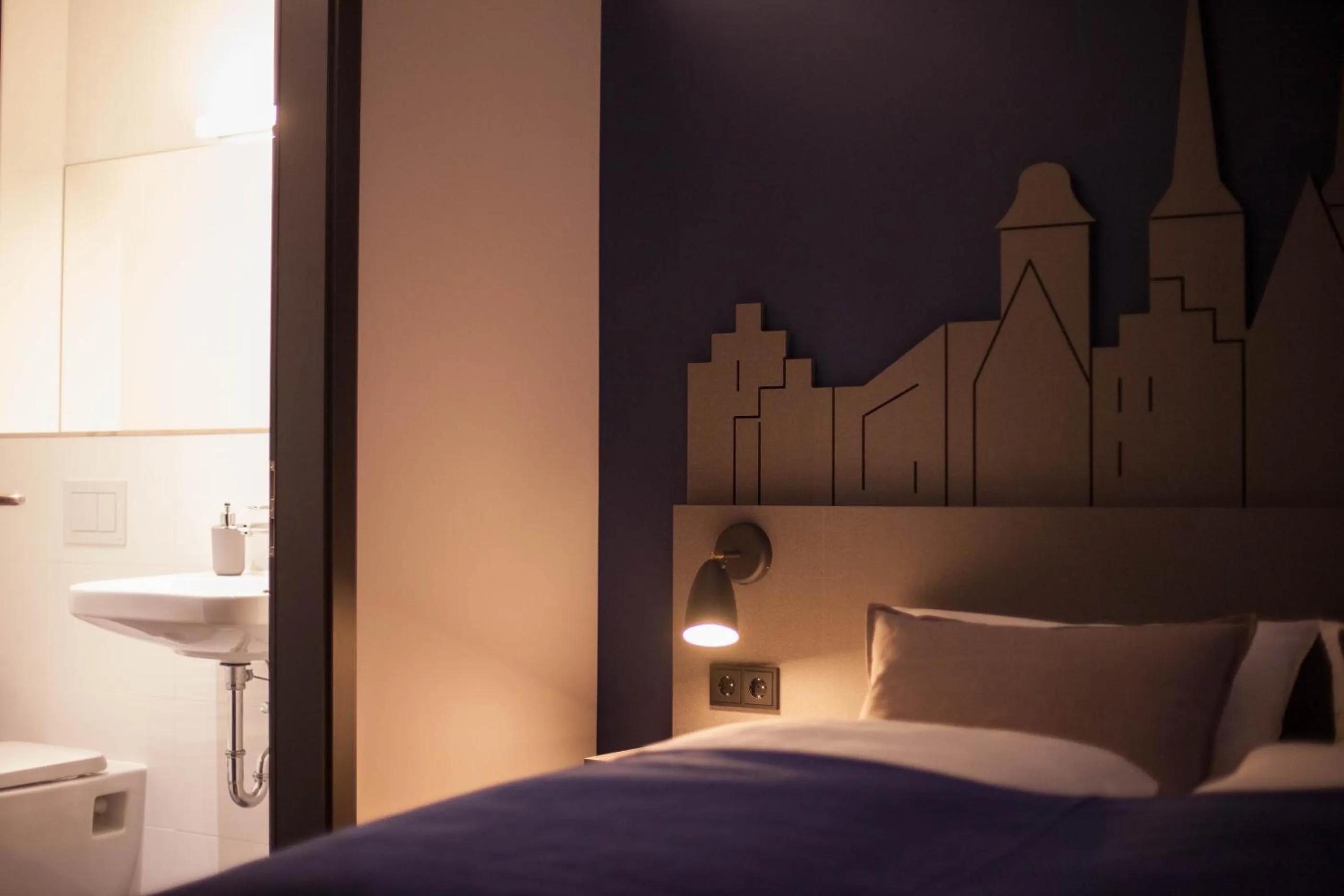 Bed in Stadtrandzimmer