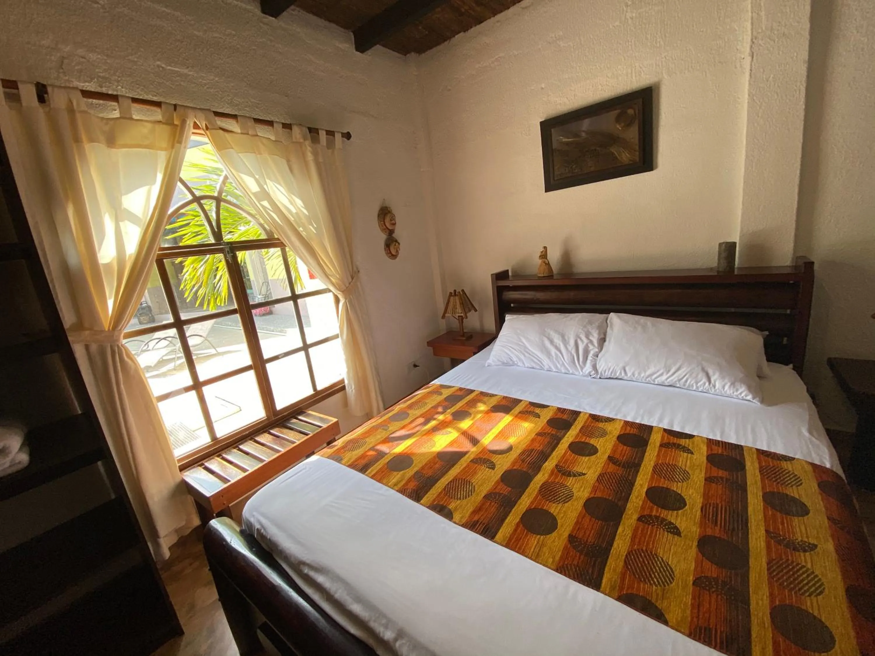 Garden view, Bed in Hotel Puerto Gaviota