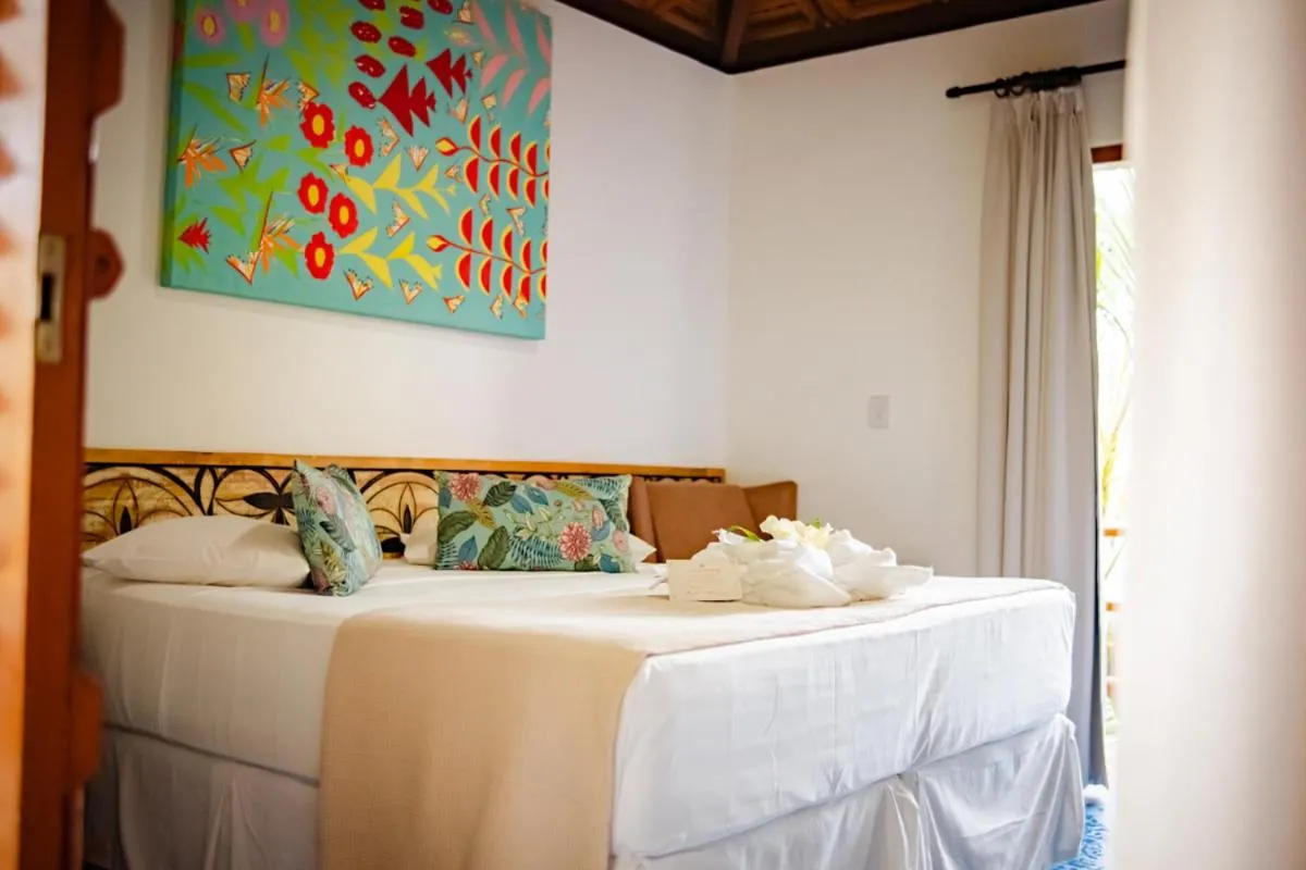 Bed in Pousada Vira Canoa