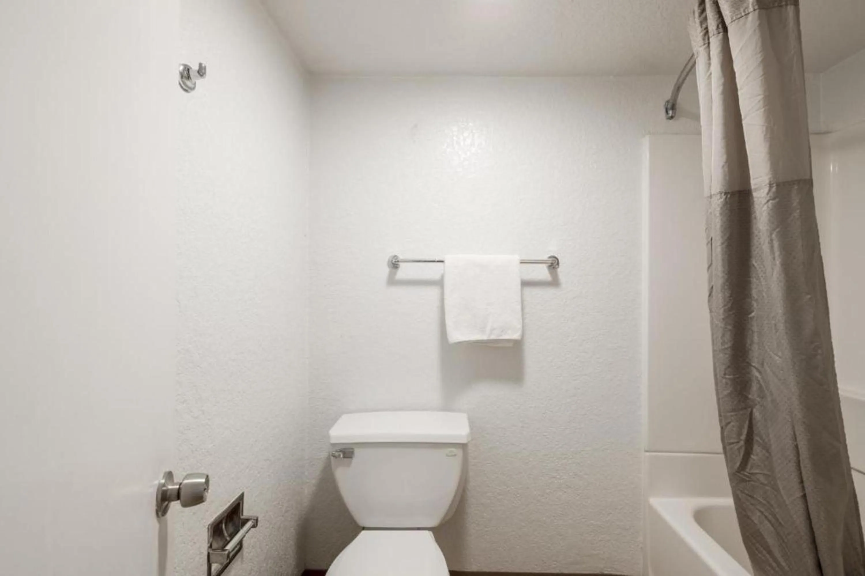 Toilet in OYO Hotel Houston Katy Freeway