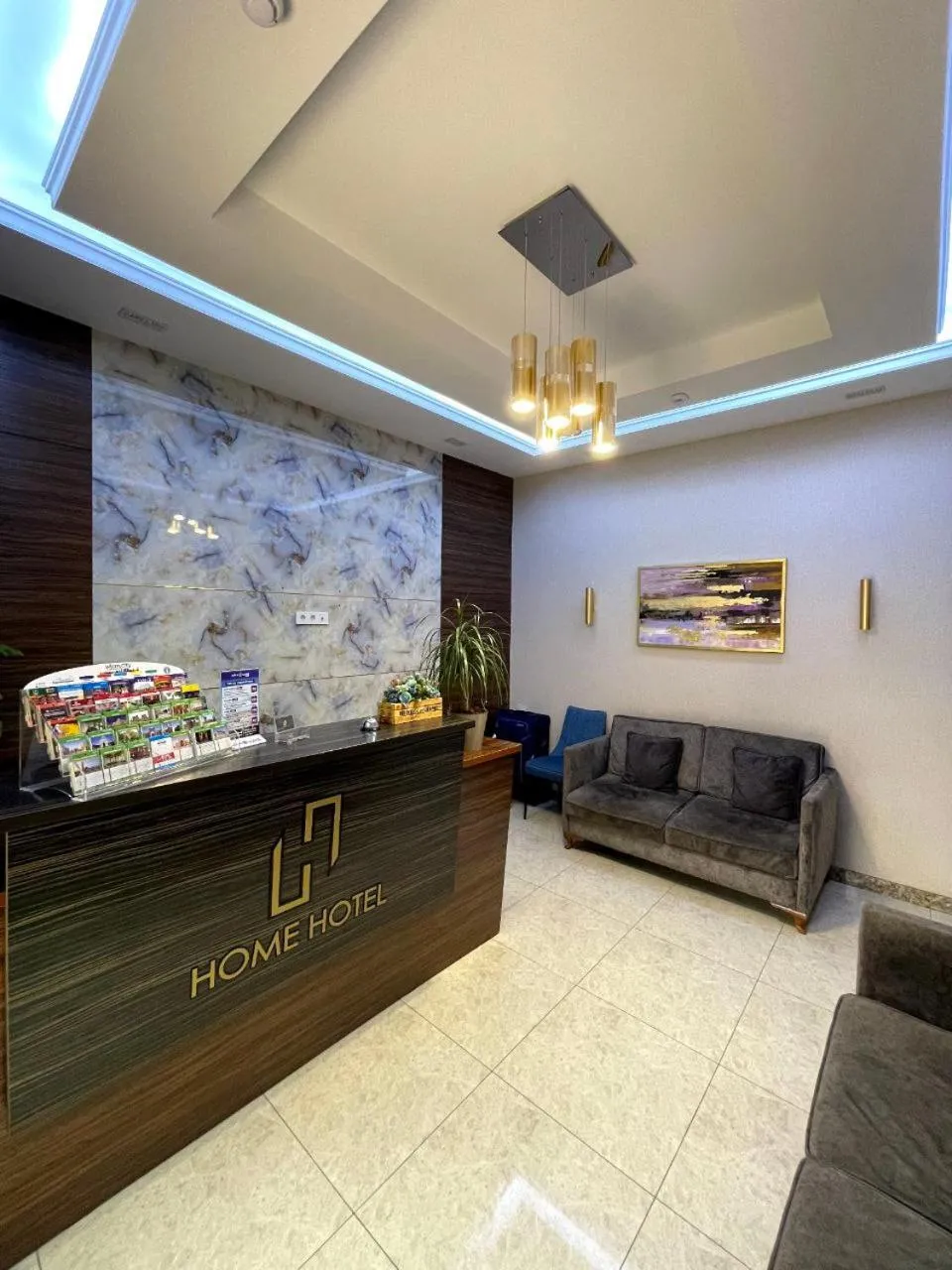 Lobby or reception in Home Boutique Hotel