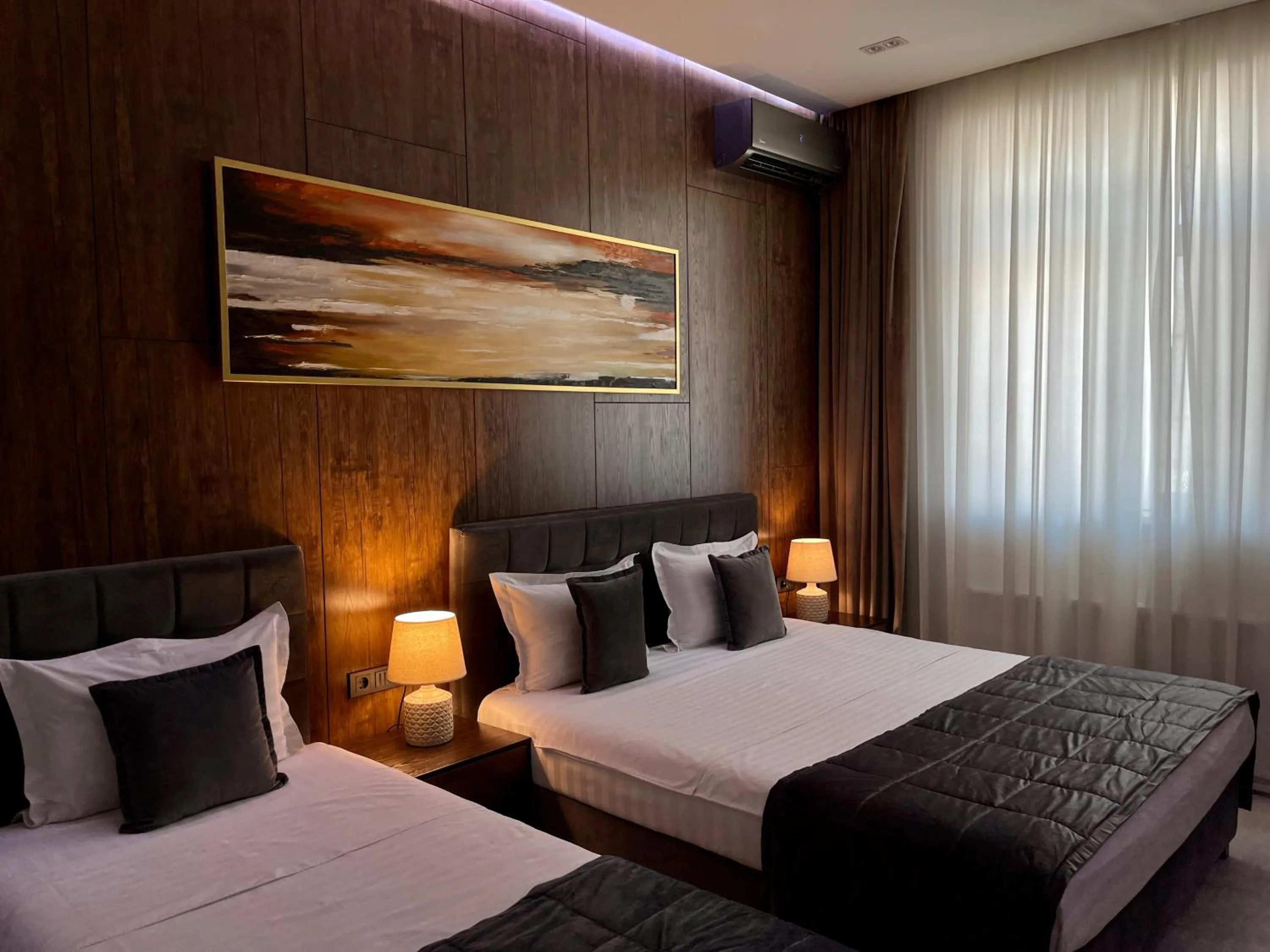 Bed in Home Boutique Hotel