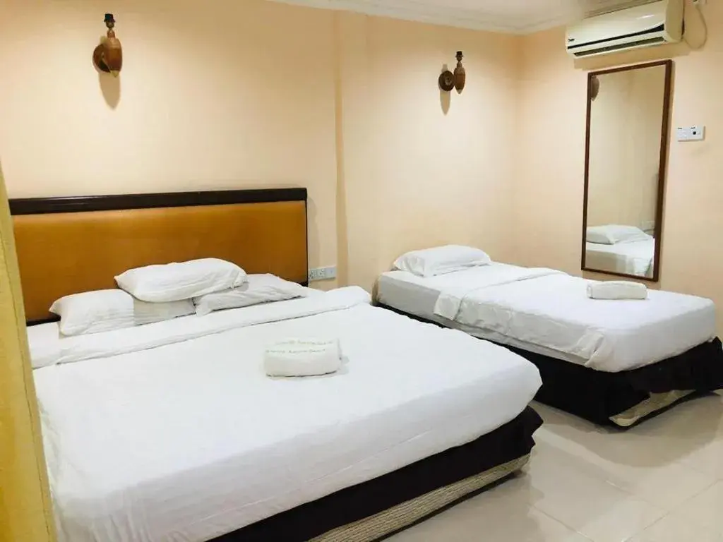 Bed in Penarak Bamboo Beach Motel Bed in Penarak Bamboo Beach Motel