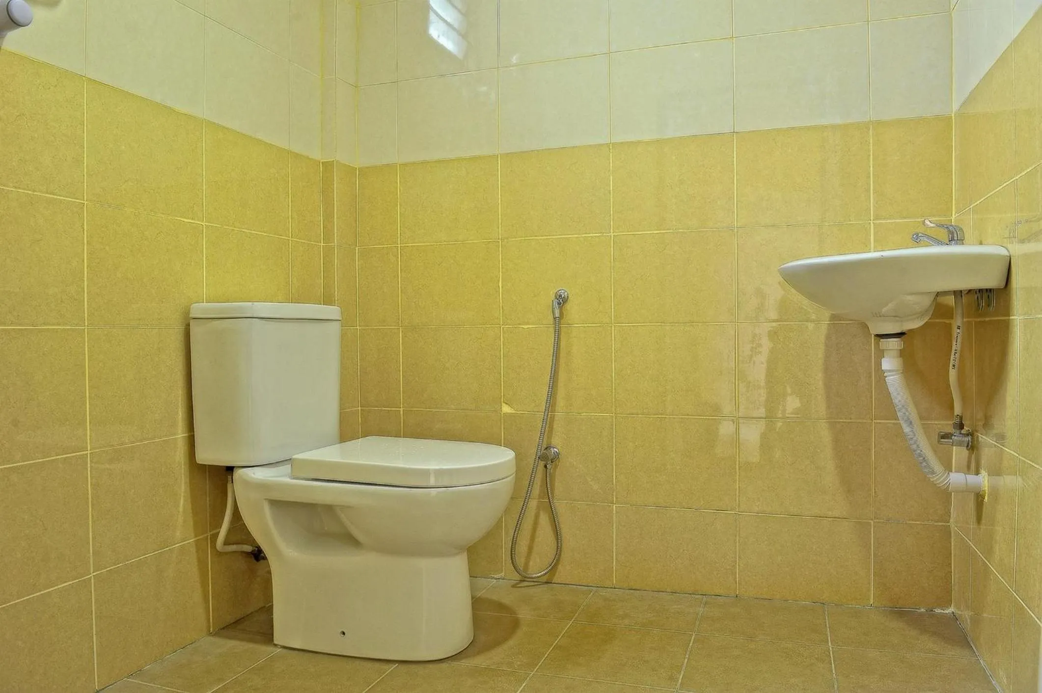 Shower in Penarak Bamboo Beach Motel