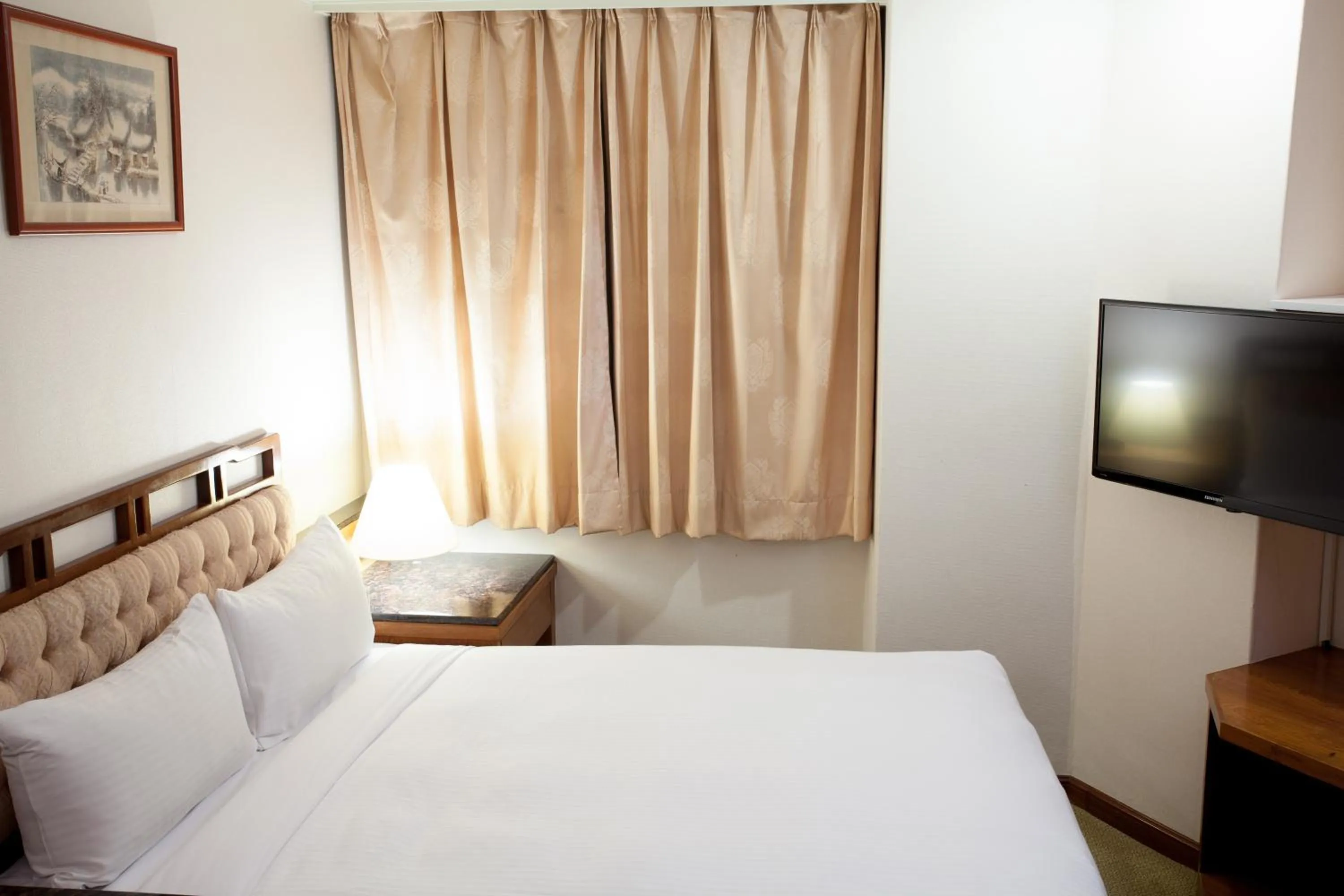 Bed in Hara Zuru Hotel