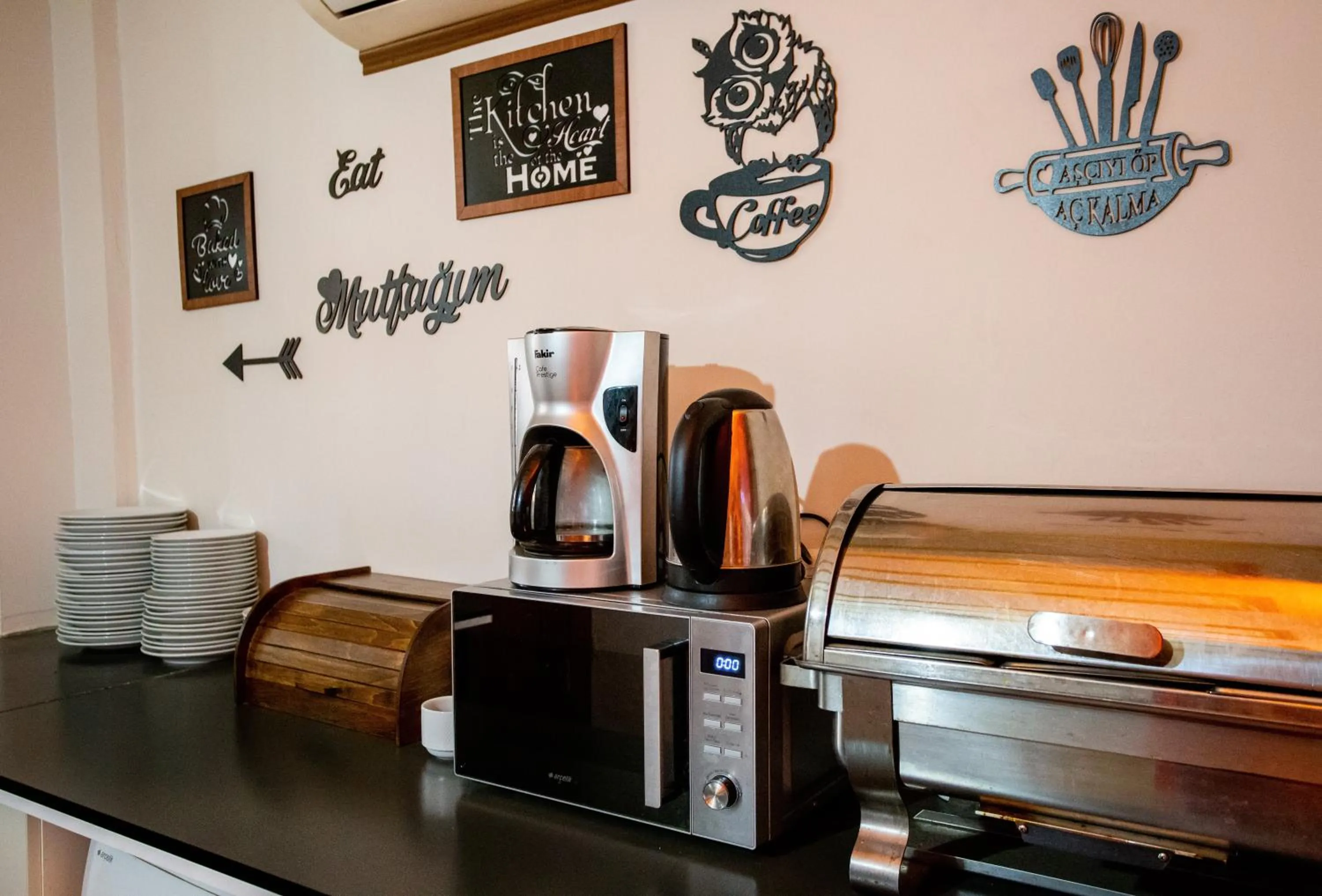 Communal kitchen in April Hotel