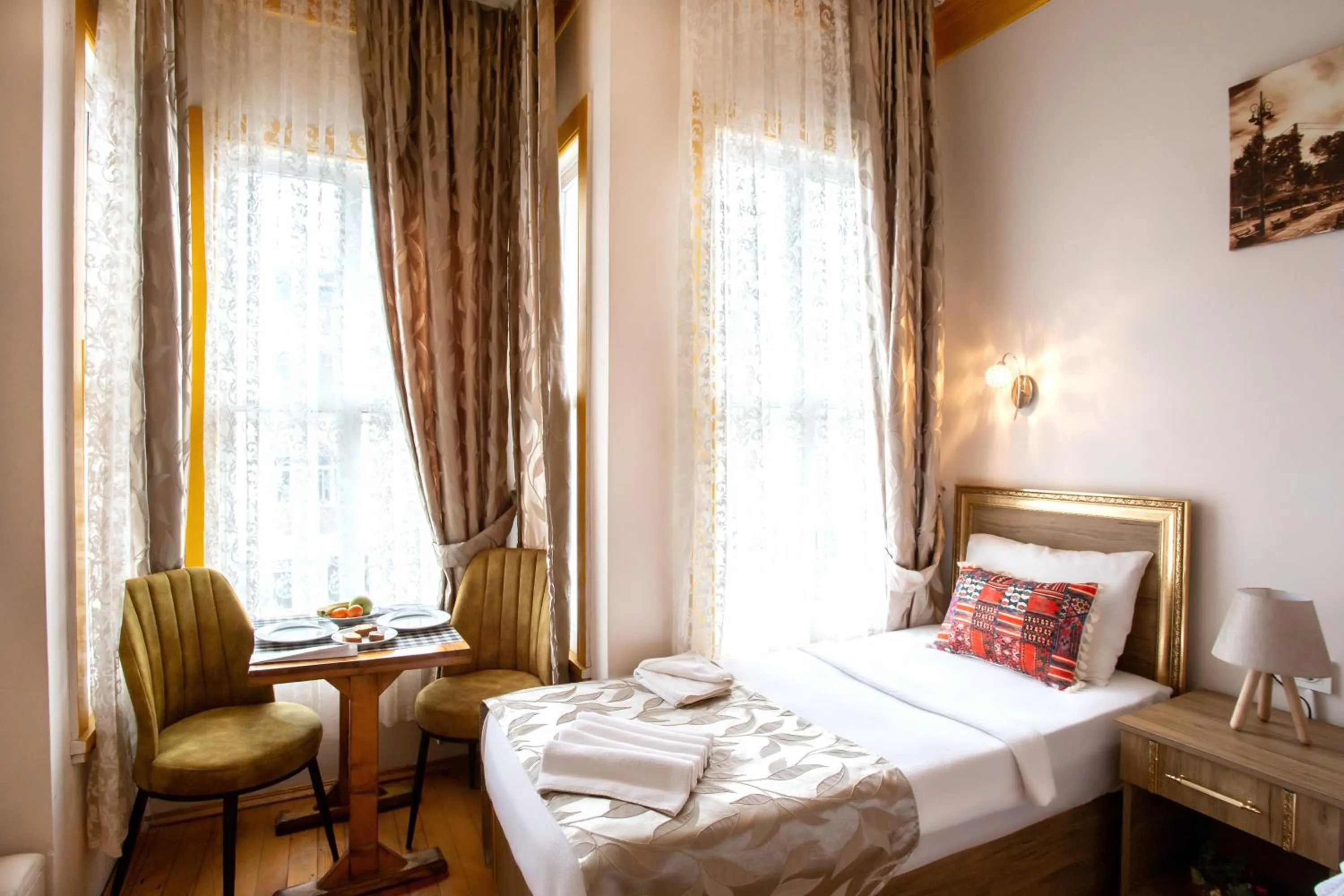 Coffee/tea facilities, Bed in April Hotel