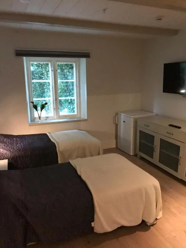 Bed in Mullbärsgårdens Bed and Breakfast