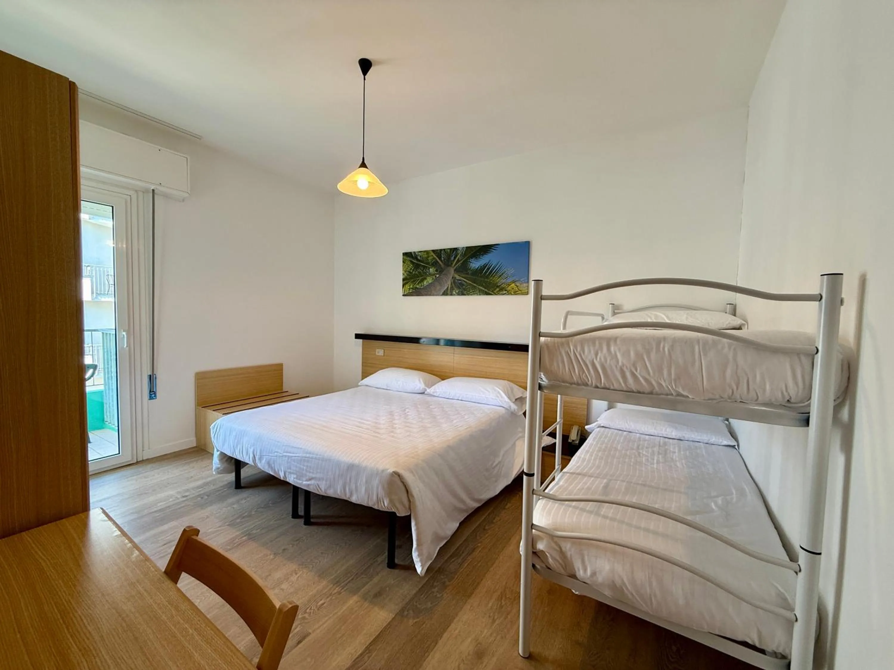 Bed in Hotel Palme