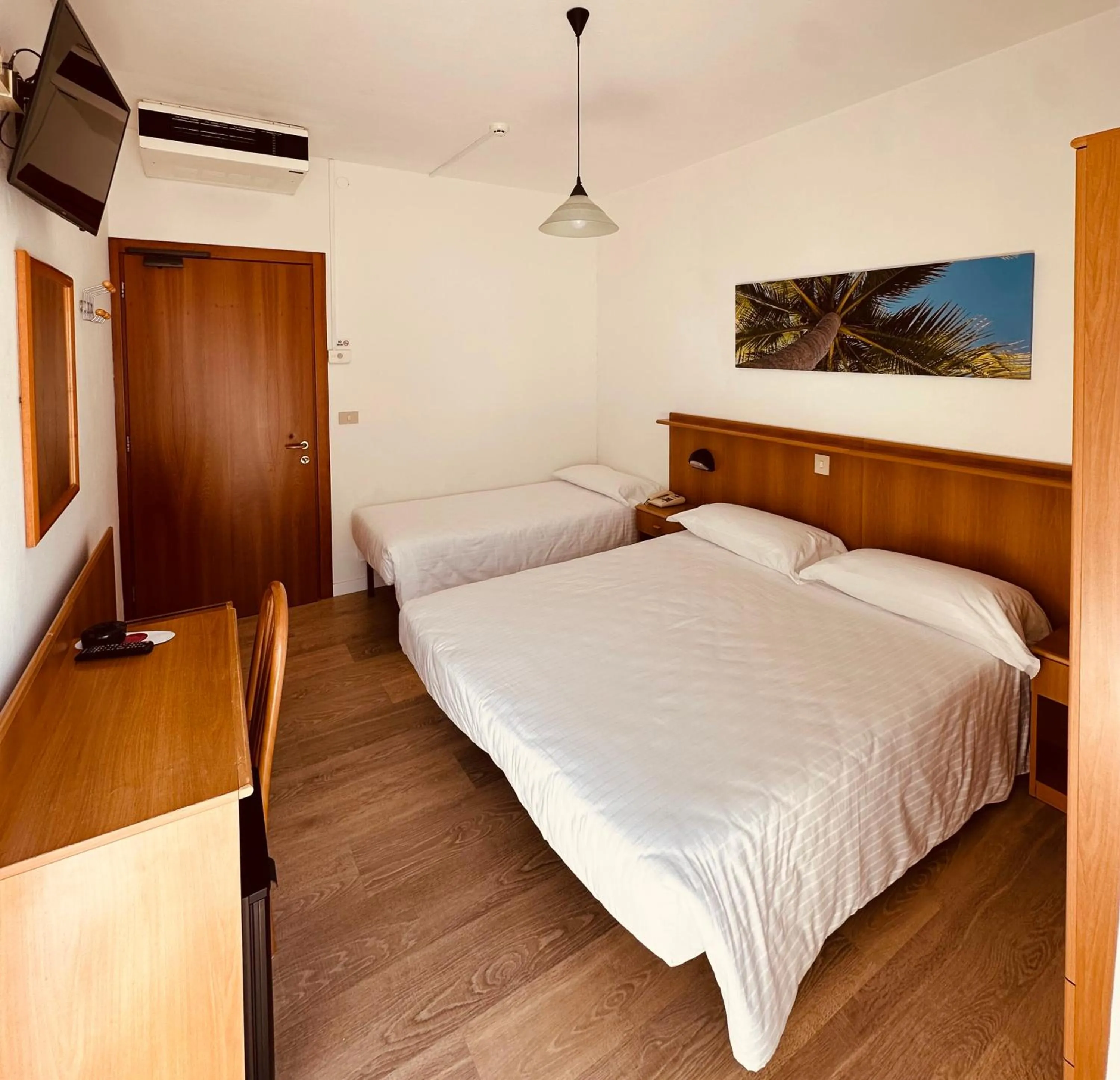 Bed in Hotel Palme