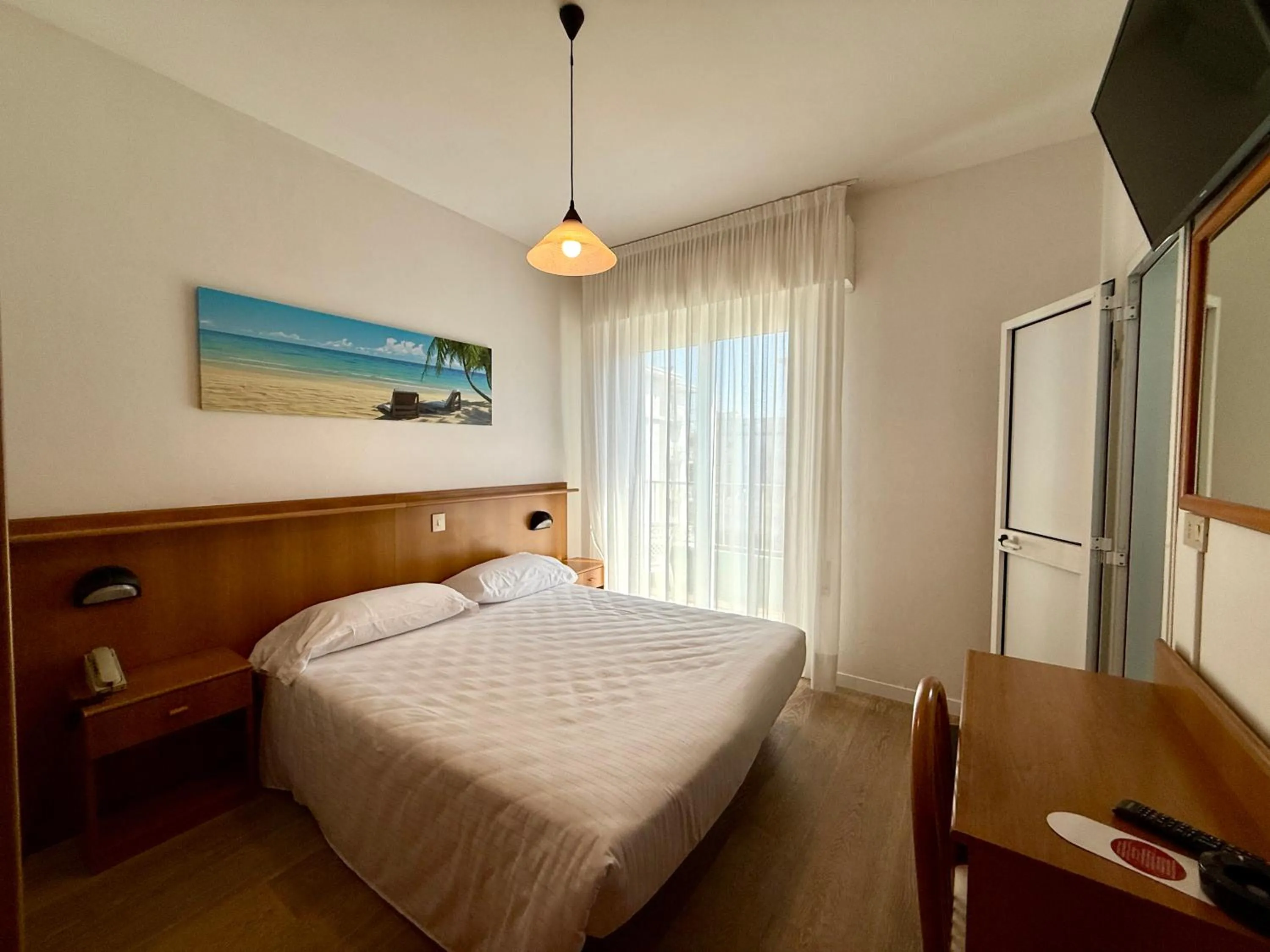 Bed in Hotel Palme