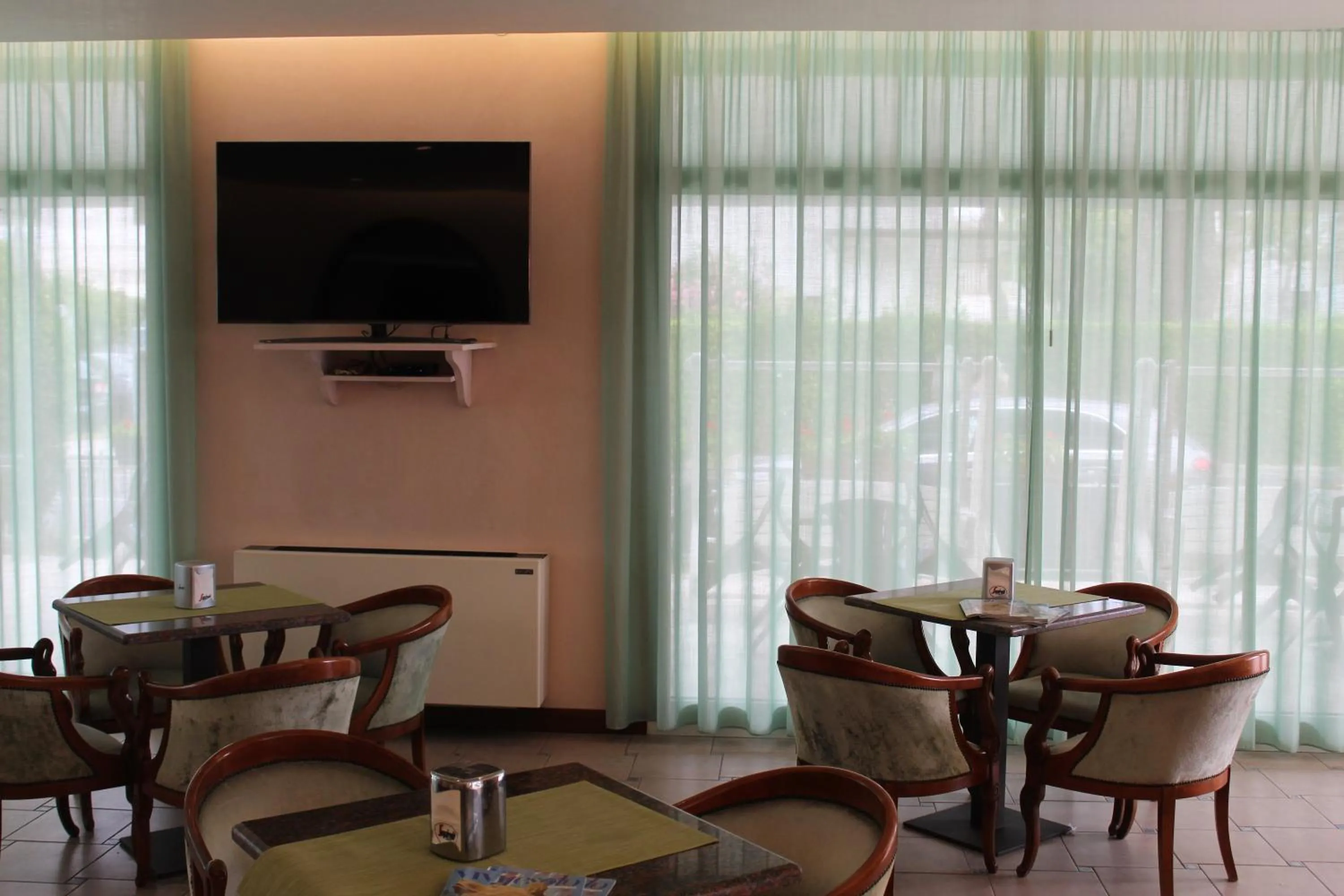 Communal lounge/ TV room in Hotel Palme