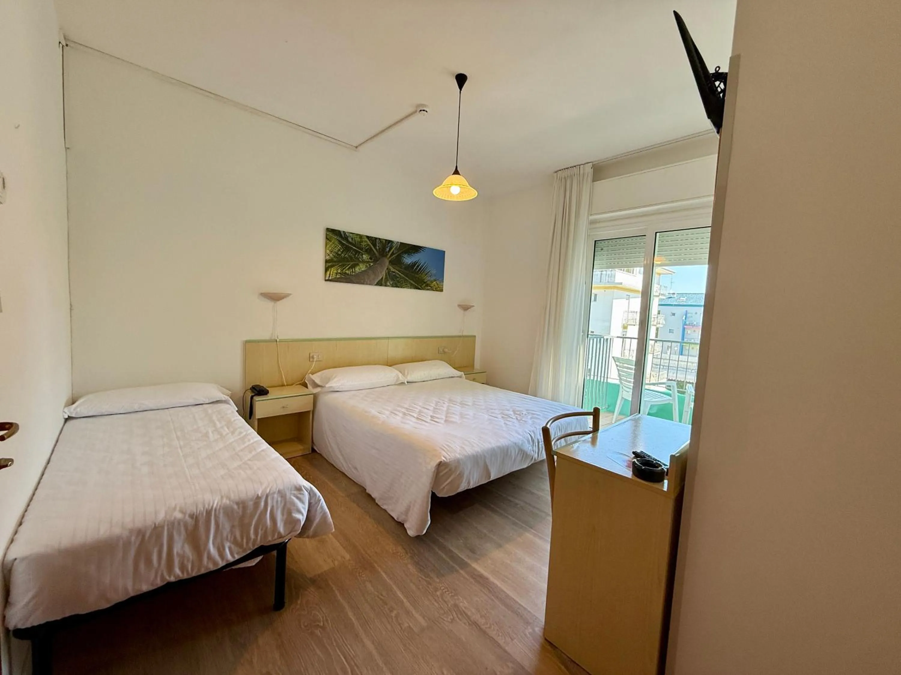 Bed in Hotel Palme