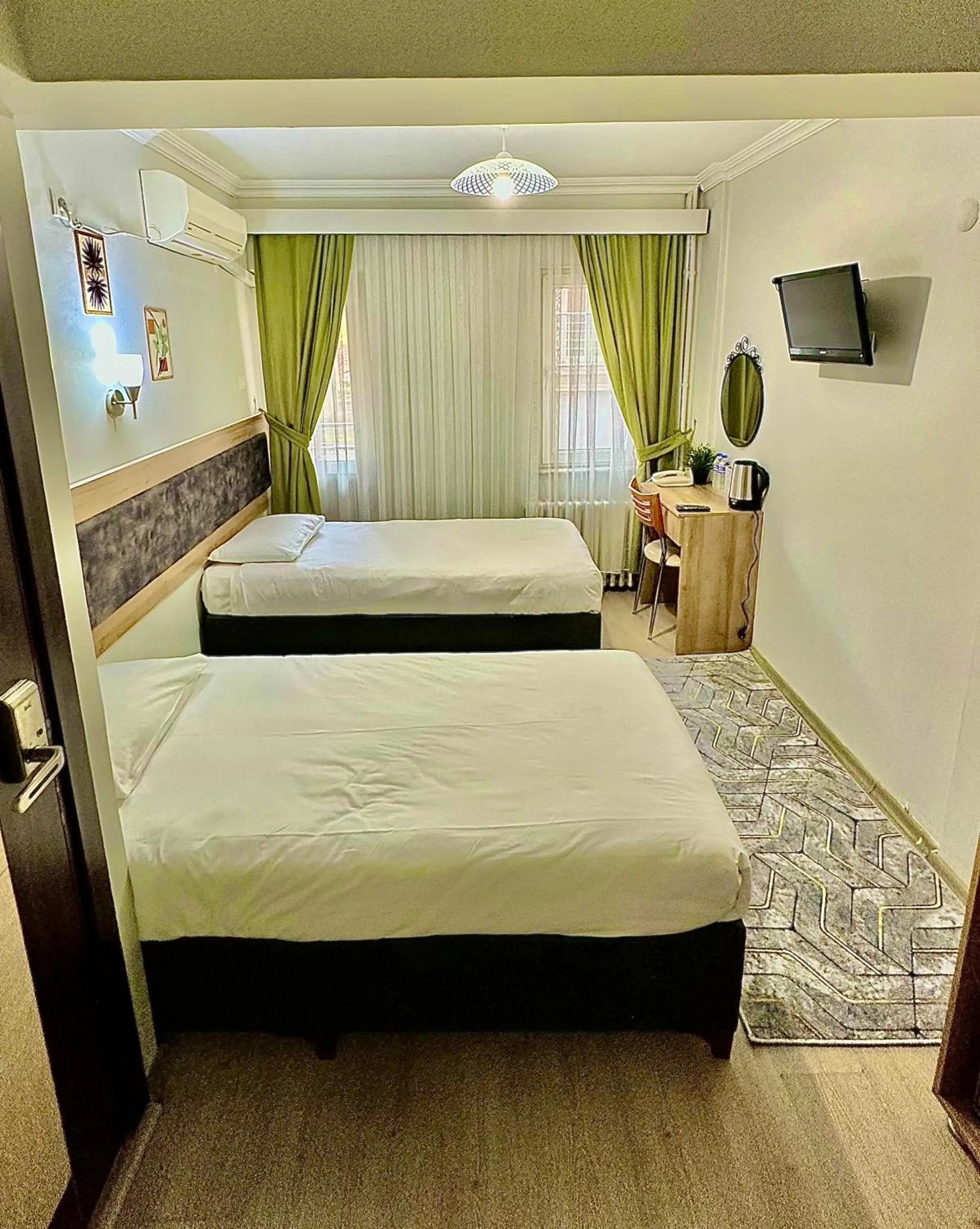 Photo of the whole room, Bed in Kestanbol Hotel