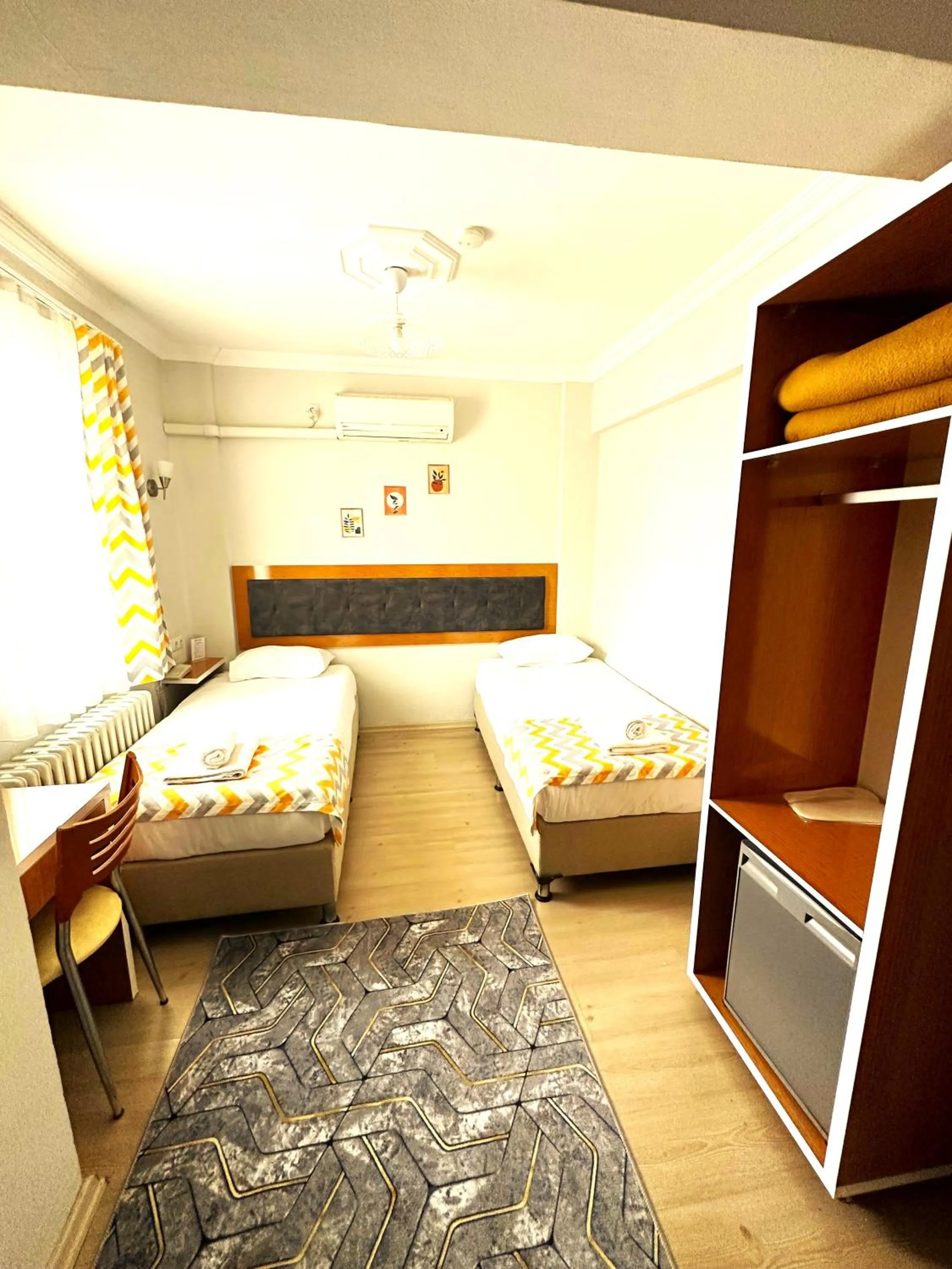 Photo of the whole room, Bed in Kestanbol Hotel