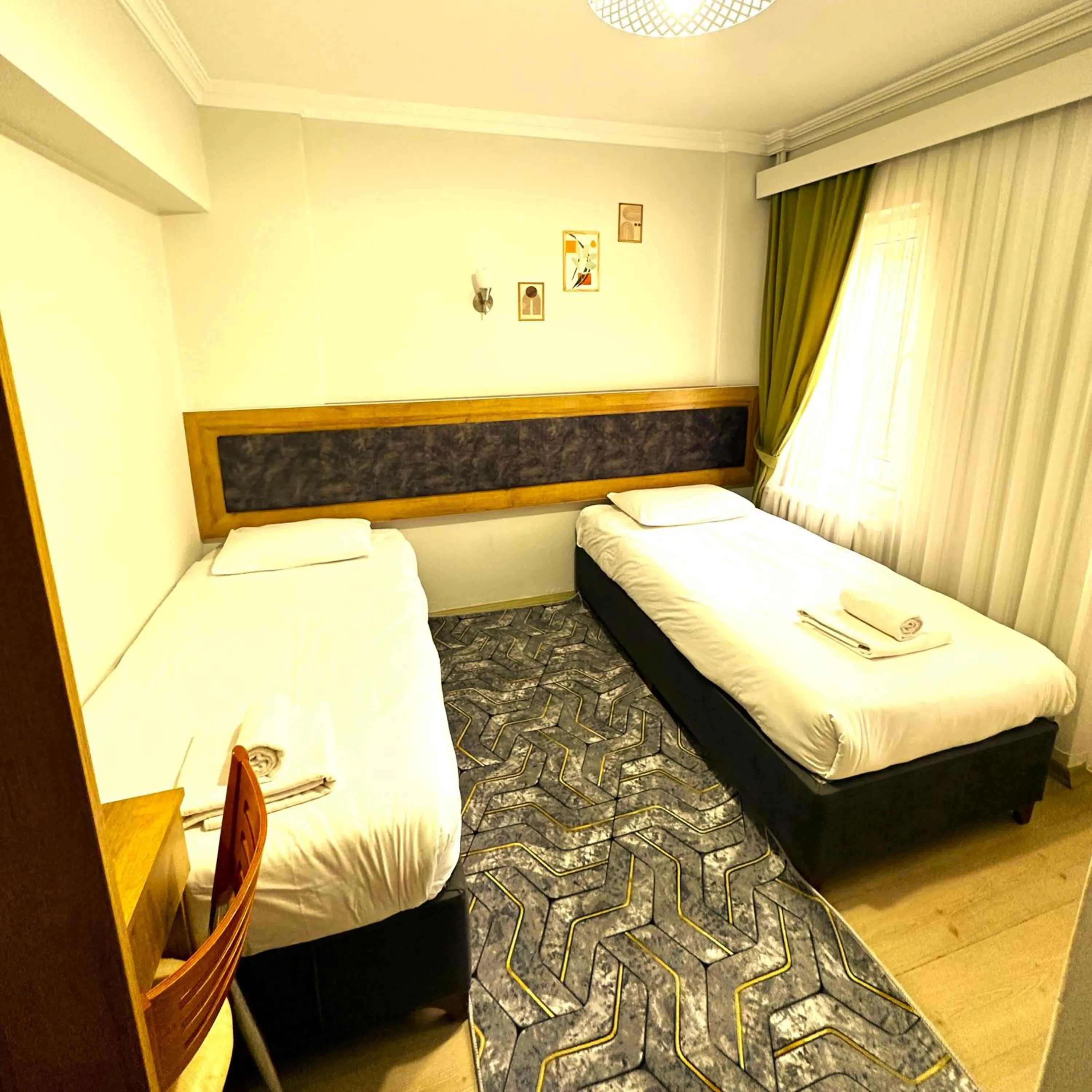 Photo of the whole room, Bed in Kestanbol Hotel