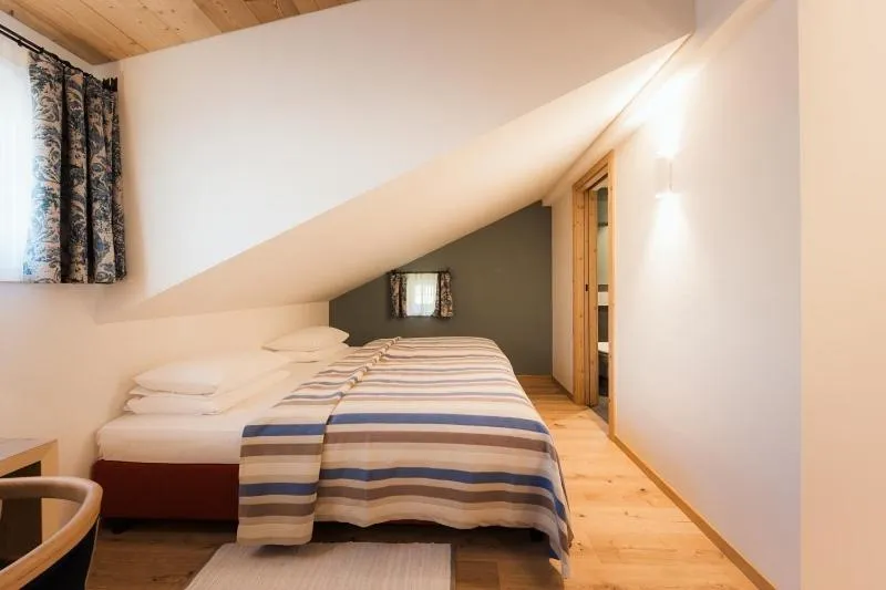 Bed in Berghotel Ladinia