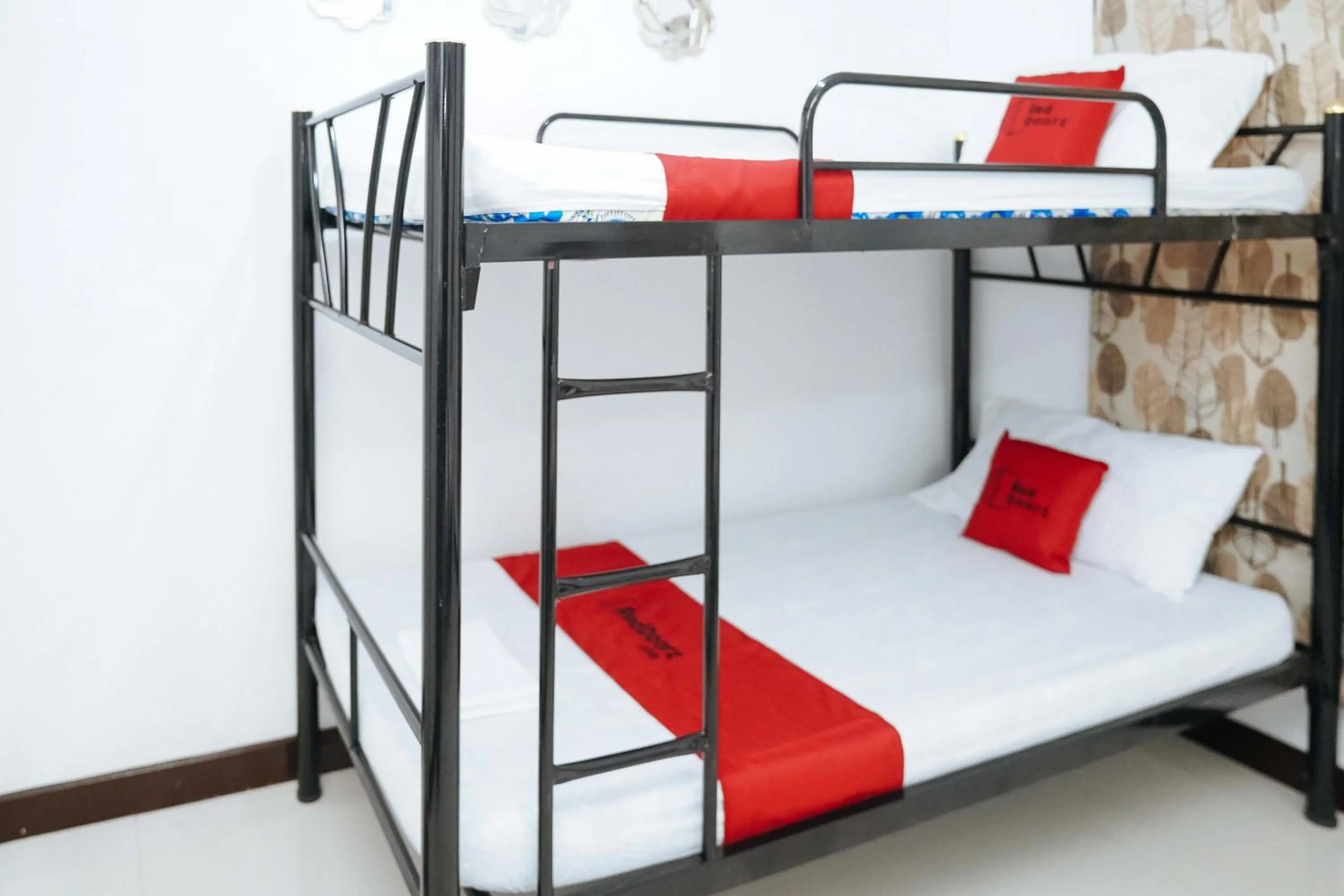 bunk bed, Bed in RedDoorz Plus at Billy's Resort Oslob