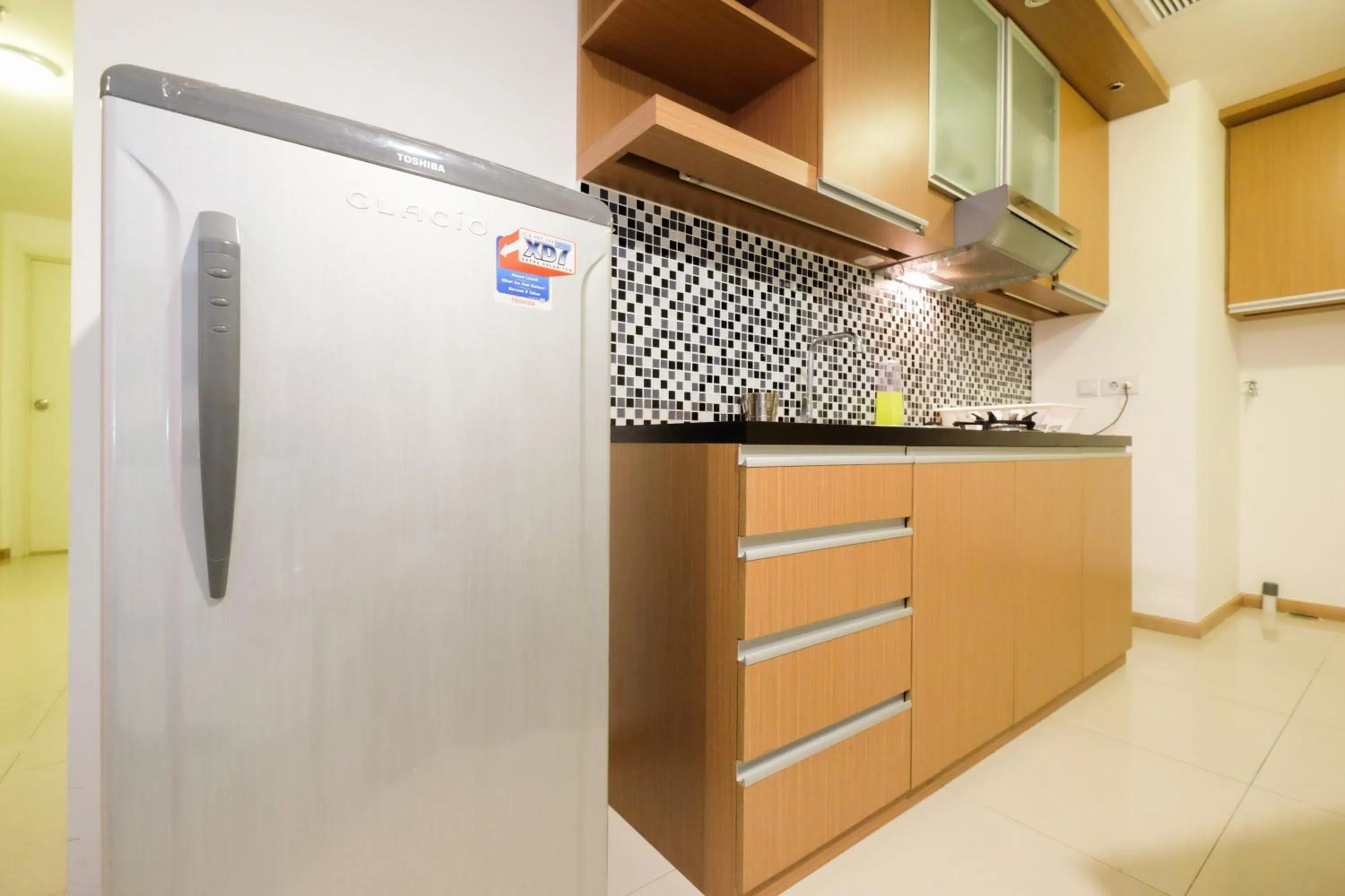 Homey 2BR Apartment at Casa Grande Residence By Travelio