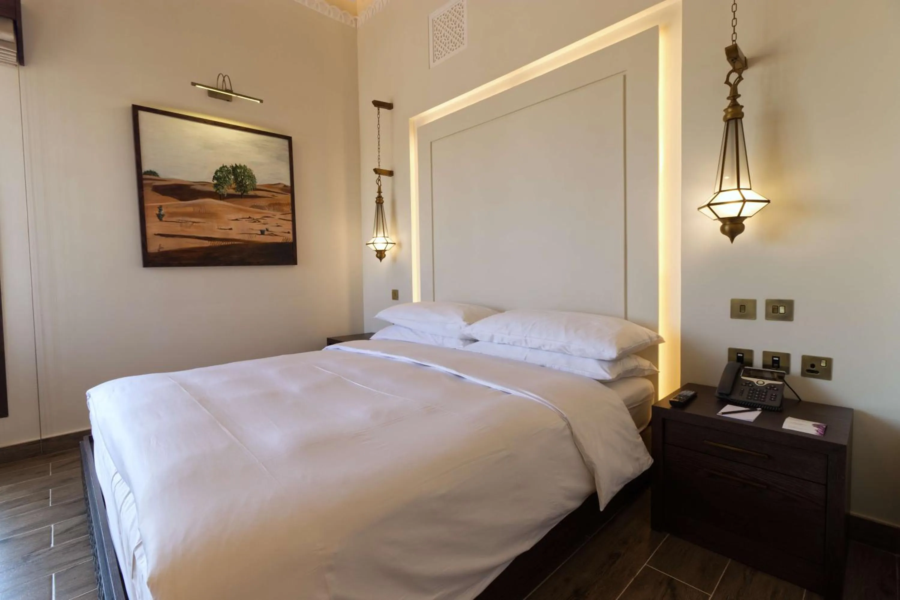 Bed in Al Badayer Retreat by Sharjah Collection