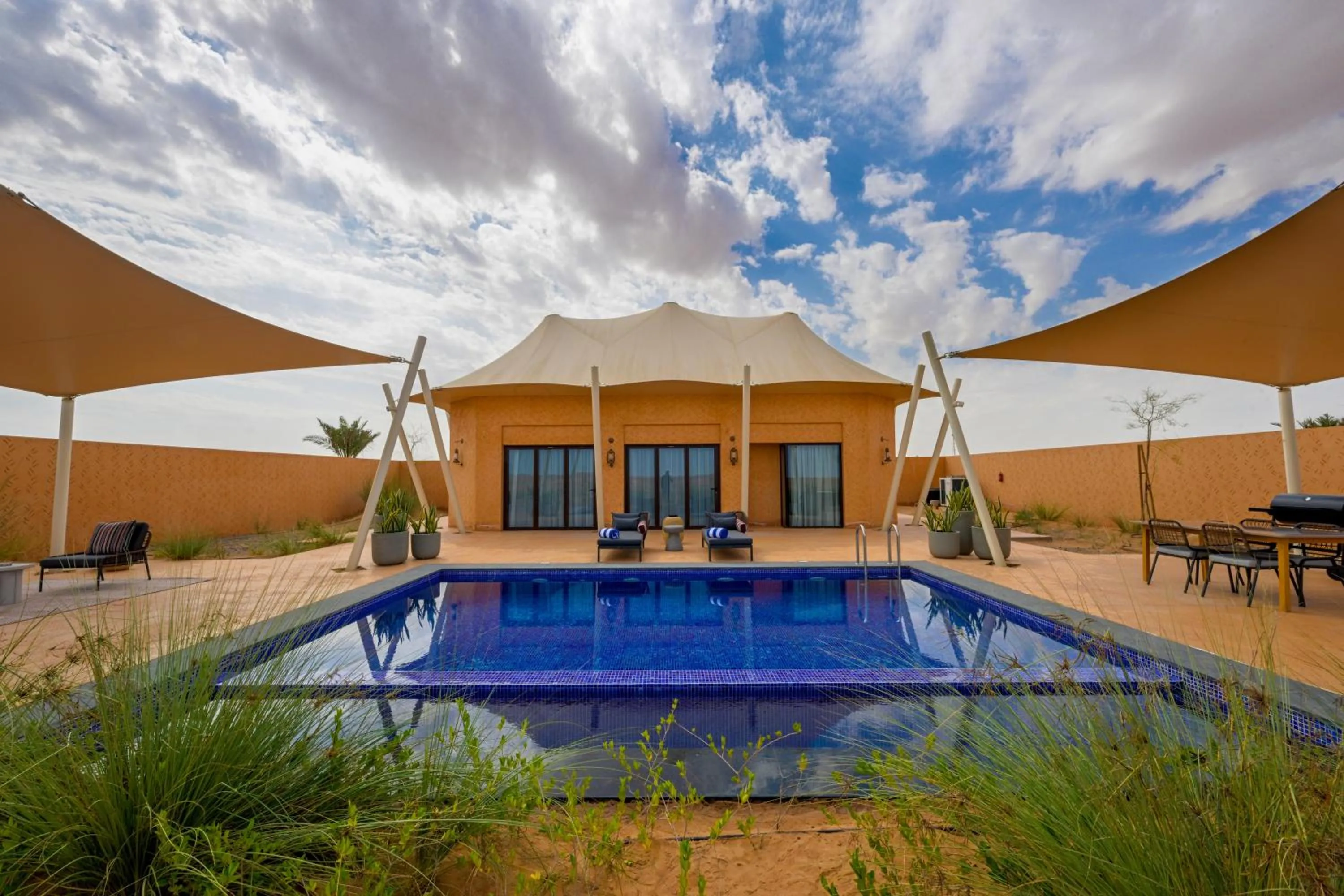 Pool view in Al Badayer Retreat by Sharjah Collection