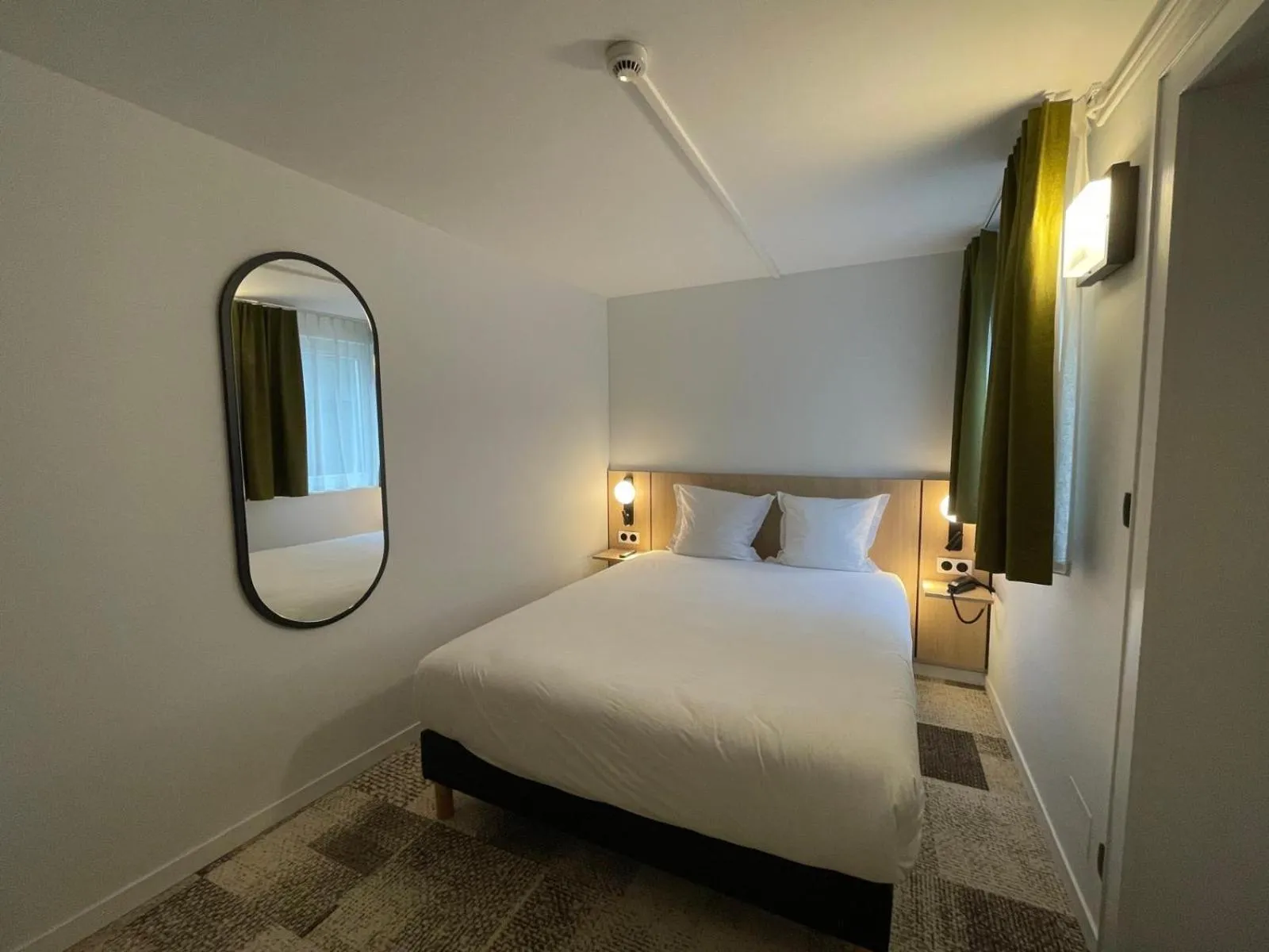 Bed in Hôtel De L'Ill