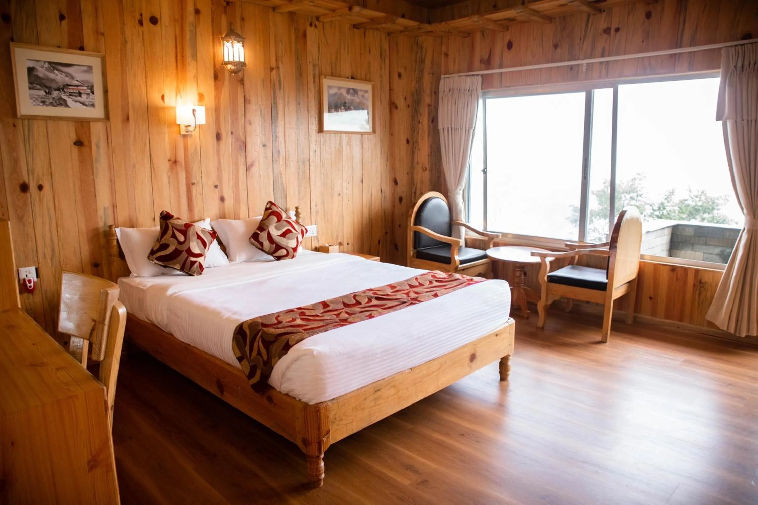 Bed in Himalayan Deurali Resort