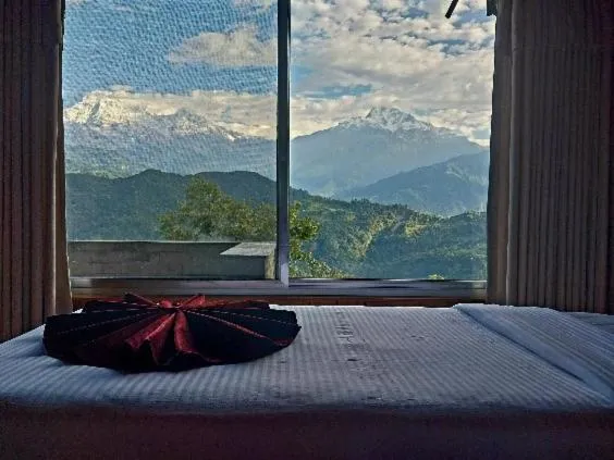 Bed in Himalayan Deurali Resort