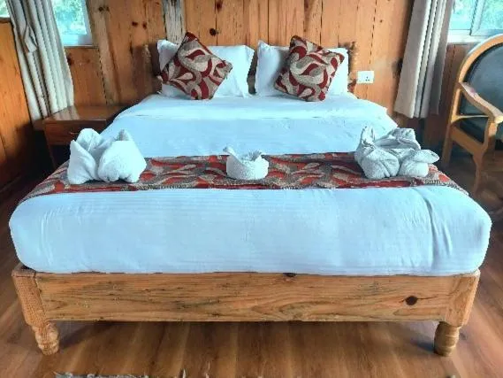 Bed in Himalayan Deurali Resort