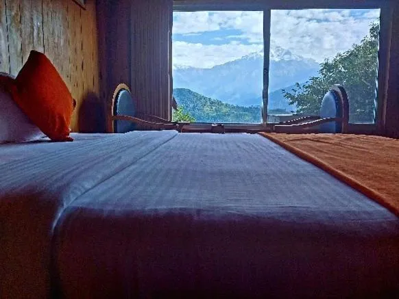 Bed in Himalayan Deurali Resort