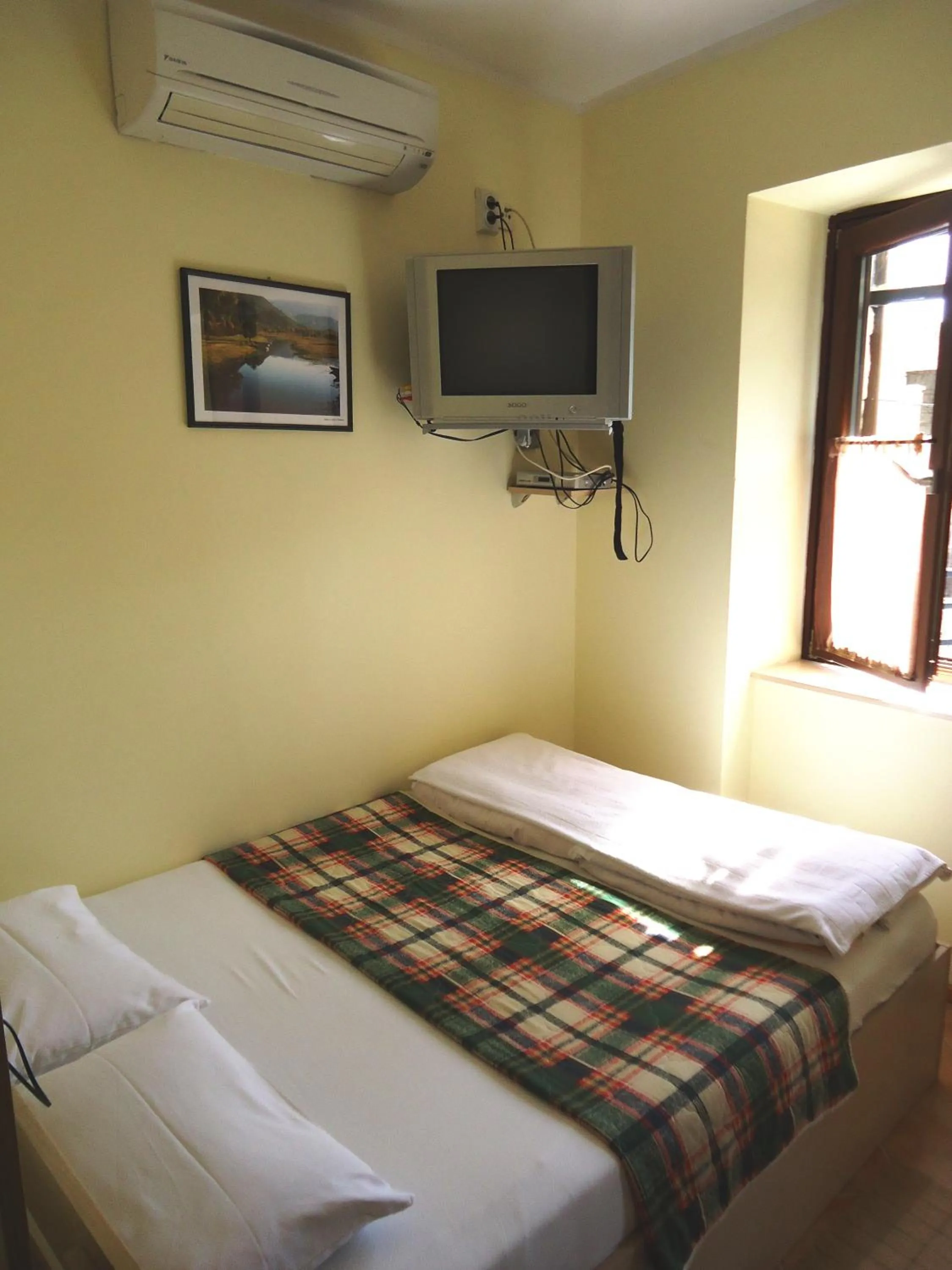 Bed in Hotel Pelikan