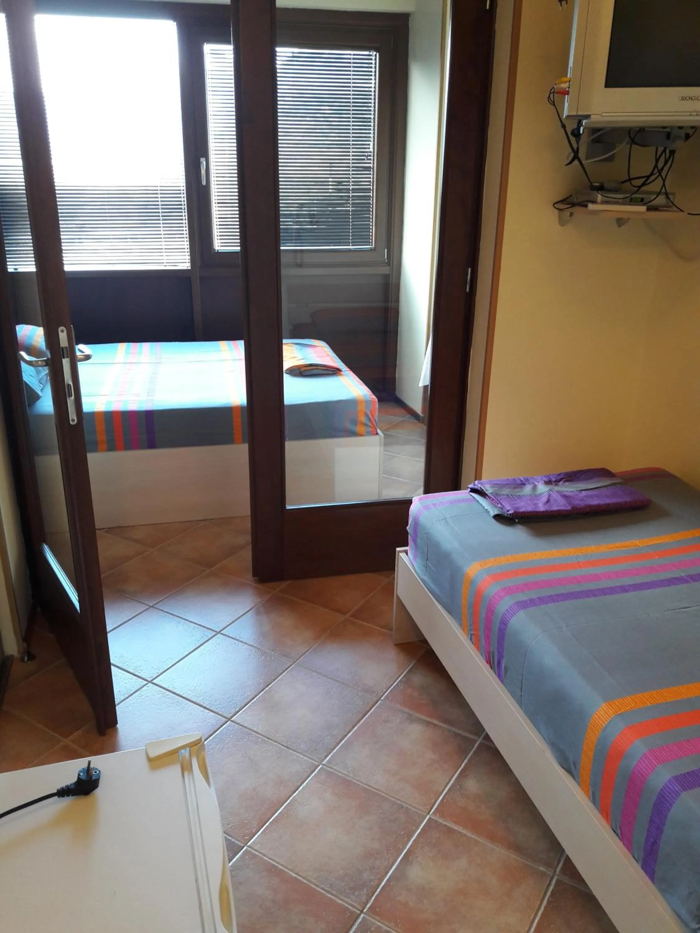 Bed in Hotel Pelikan